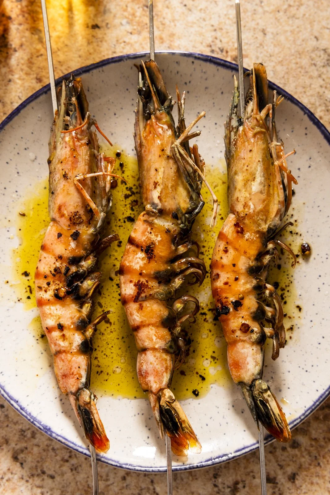 Three whole grilled prawns / shrimp, photographed by Matthew Taylor-Gross - food styling, commercial food stylist NYC
