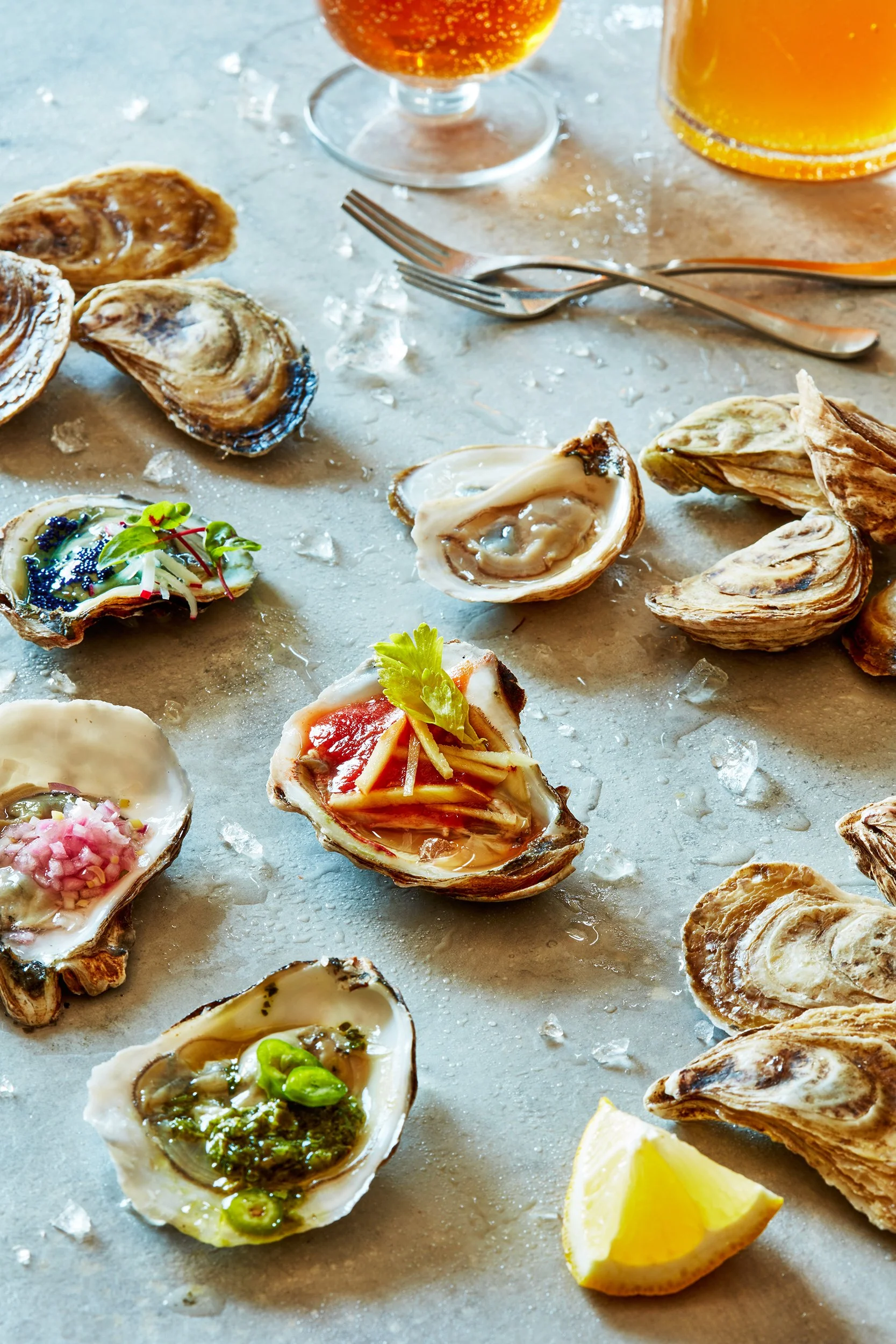 Stop motion of oysters, some with toppings shot for a concept shoot, photographed by Cheng Li -  food styling, commercial food stylist NYC
