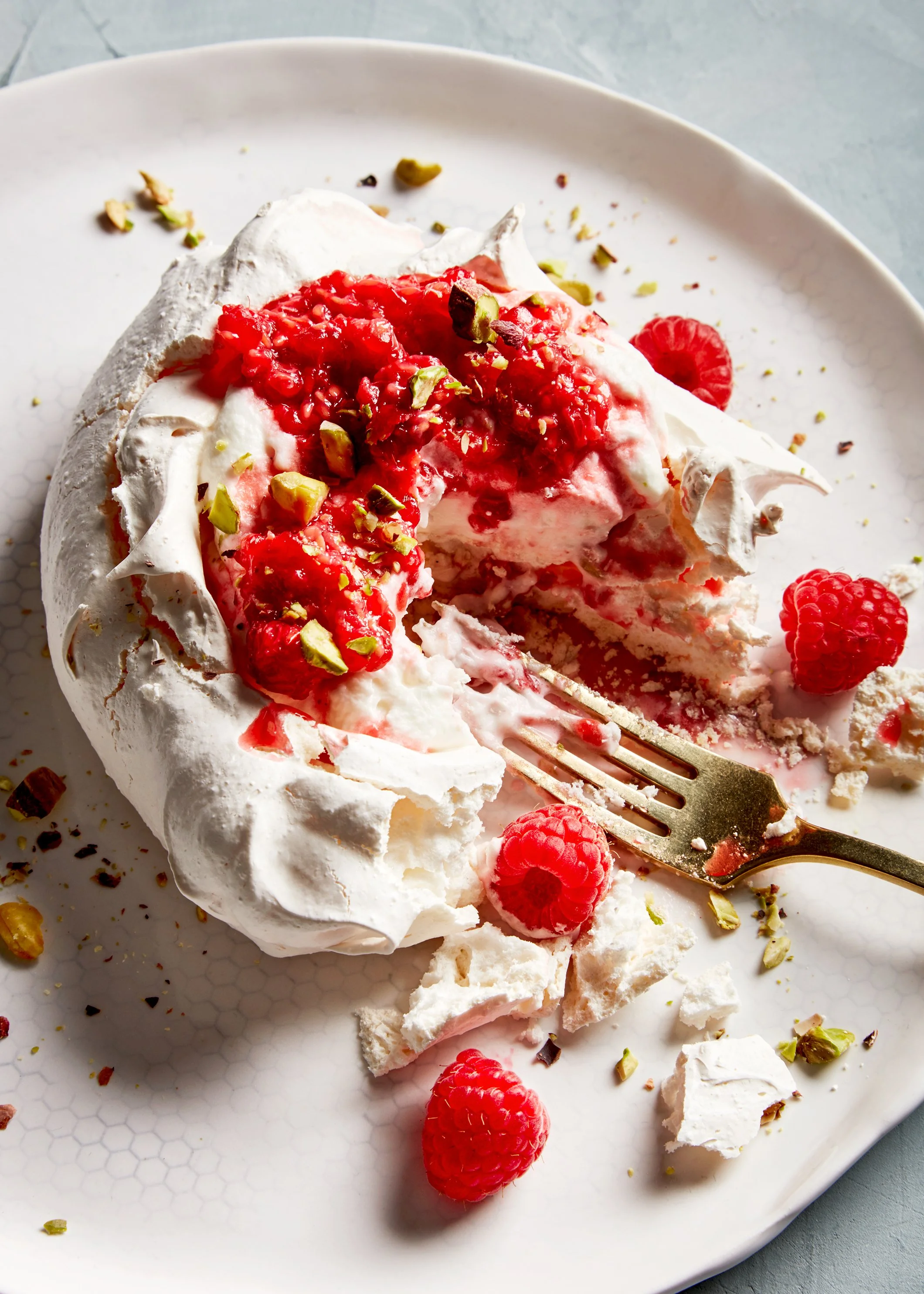 Pavlova with pistachio and raspberry for a test concept shoot - food styling, commercial food stylist NYC