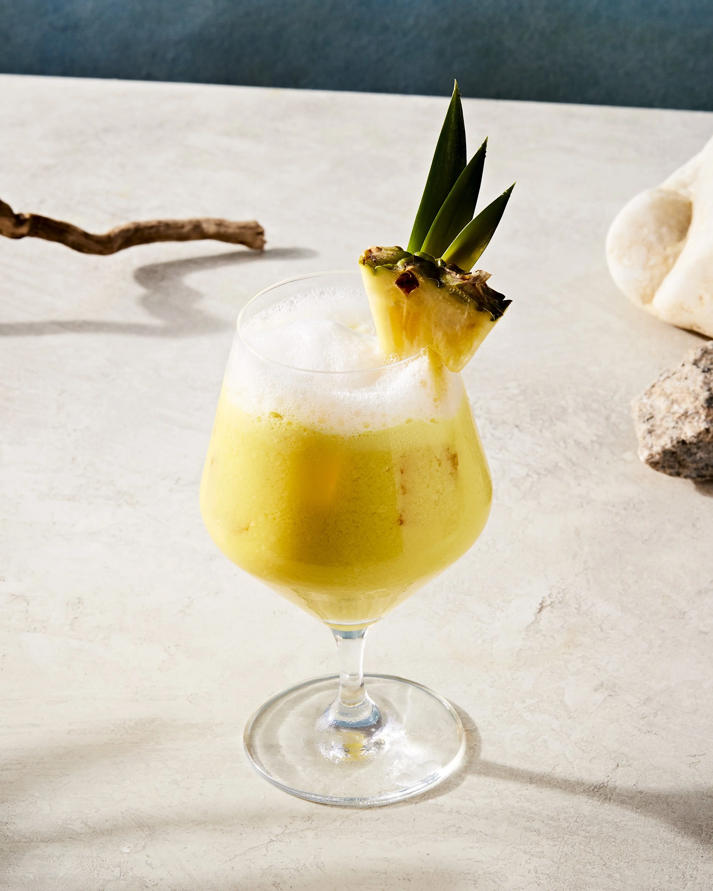 Cocktail concept shoot showing a pina colada  cocktail  - food styling, commercial food stylist NYC photographed by Rachel Vanni
