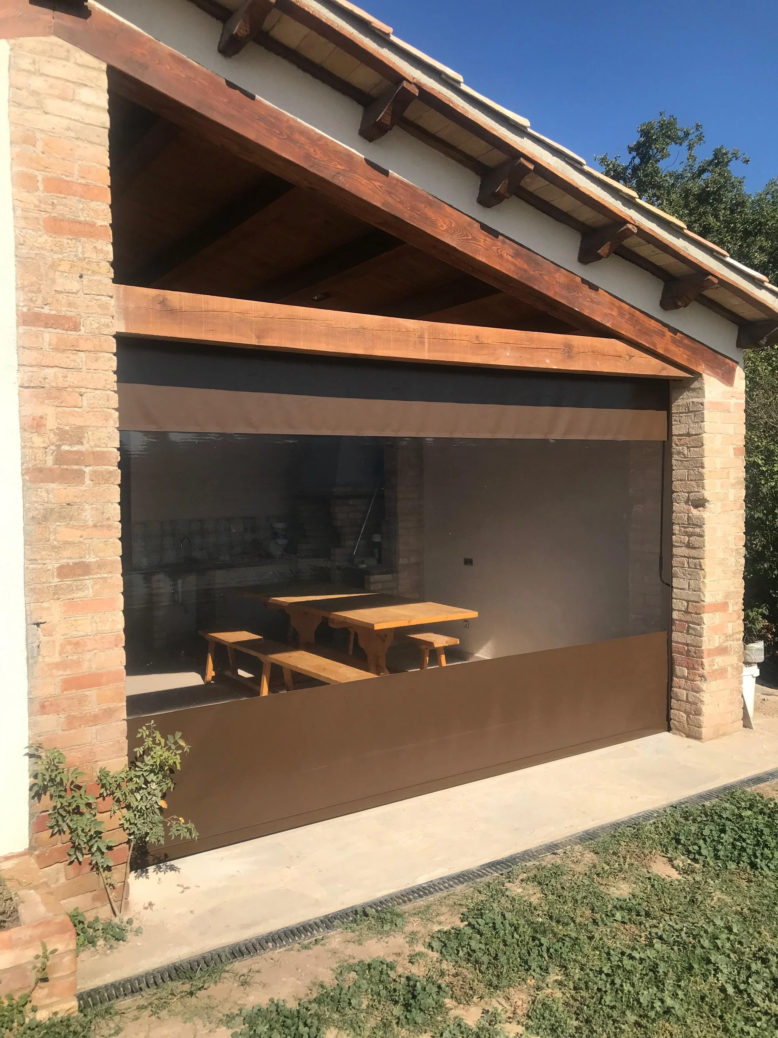 Vertical amb varilles i PVC transparent