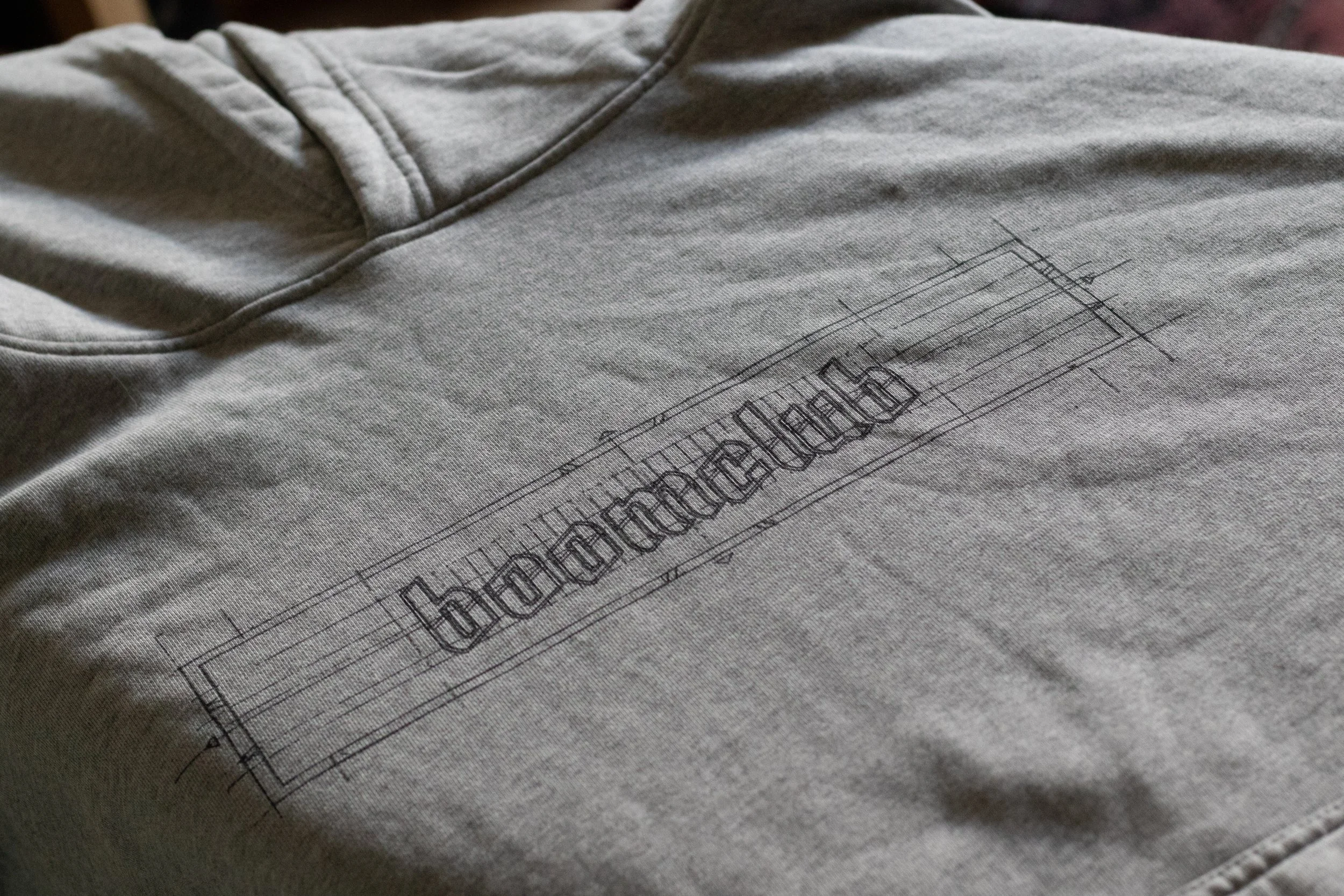 Grey Hoodie Logo.jpg