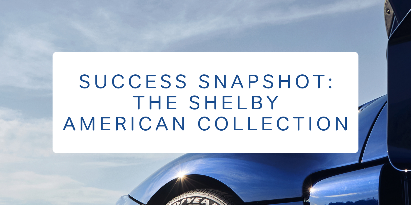 A blue supercar shines in the sunlight