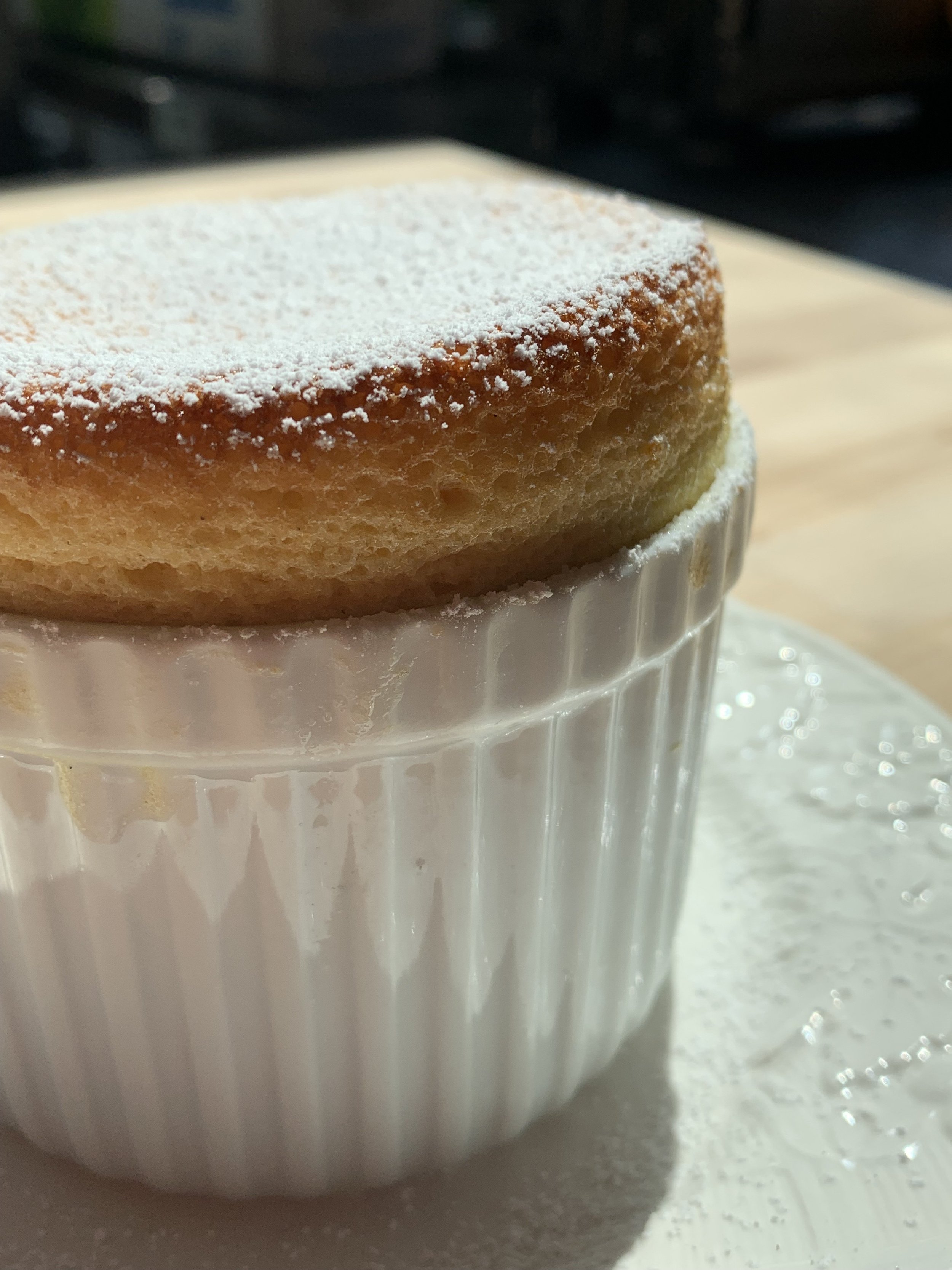 Breakfast souffle. A french toast souffle with cinnamon creme anglaise and peach bourbon infused maple syrup.