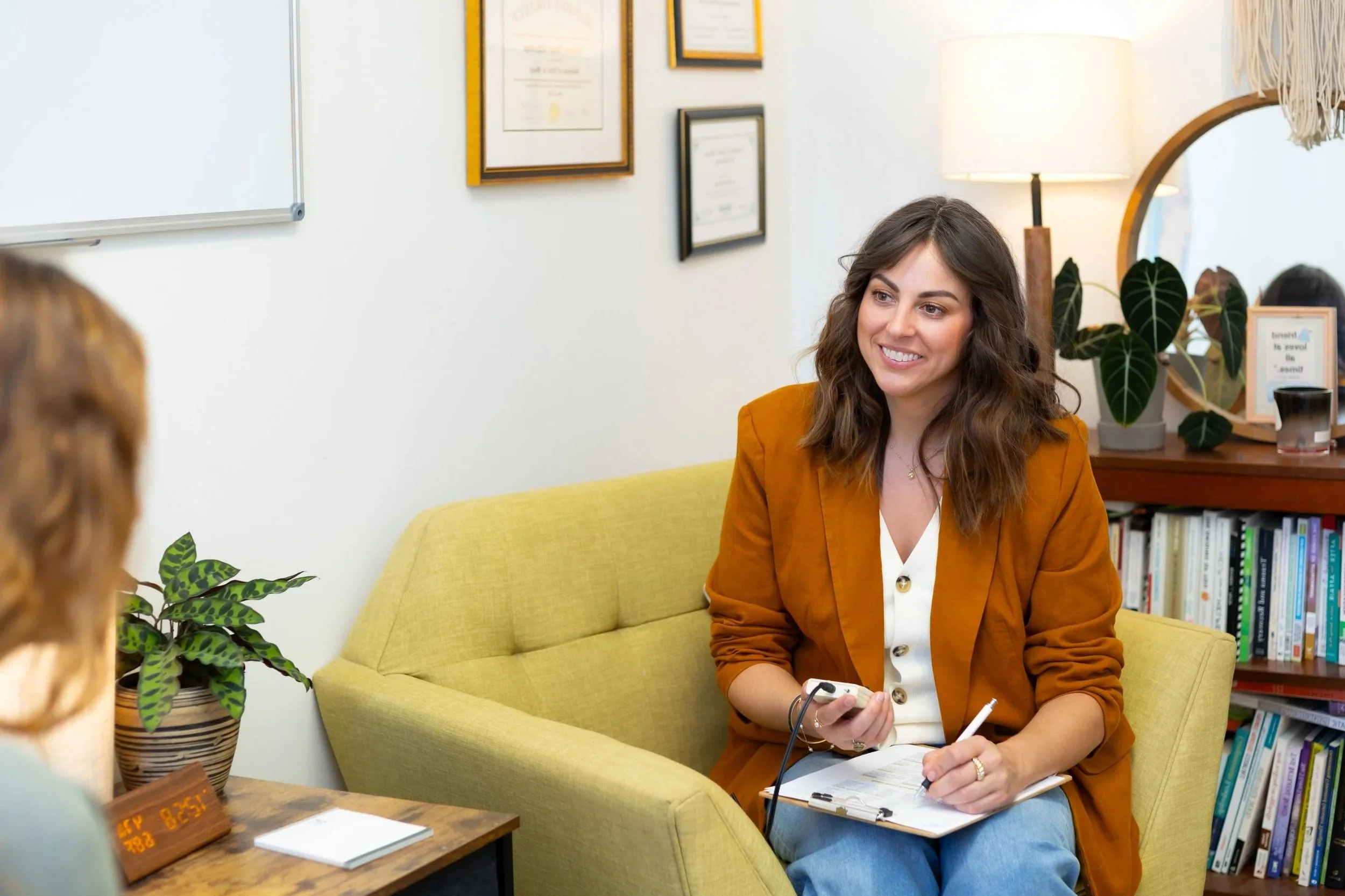 Landrie Ethredge counseling group founder doing EMDR therapy with millennial woman