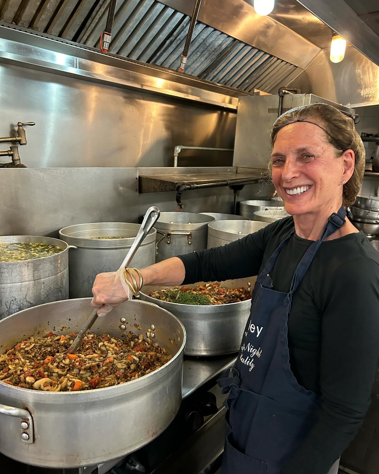 Chef Shelley stirring up her quinoa, lentil &amp; mushroom stew. Chef Veej&rsquo;s chicken daal and part of our cleanup crew. Just a few of the dozens of people serving our neighbors