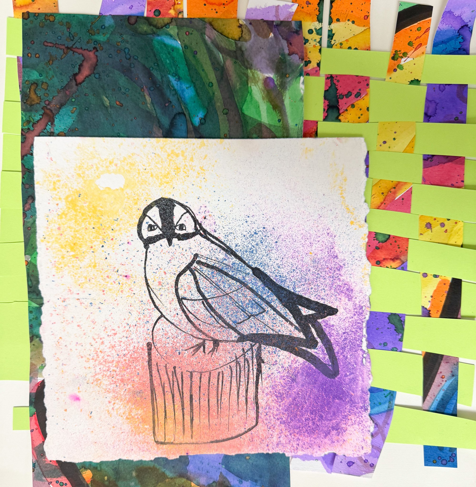 A line drawing of a bird perched on a tree stump, set against a colorful splatter background with yellow, pink, blue, and purple hues, surrounded by abstract, vibrant artwork and strips of yellow paper.