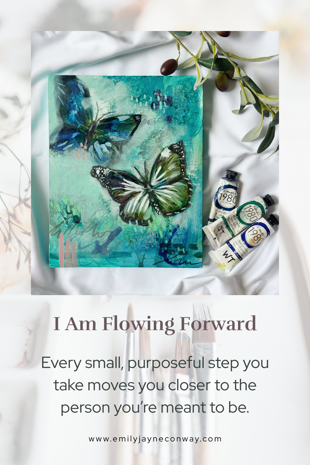An art print featuring two colorful butterflies against a teal background, surrounded by tubes of paint and olive branches, with motivational text about moving forward.
