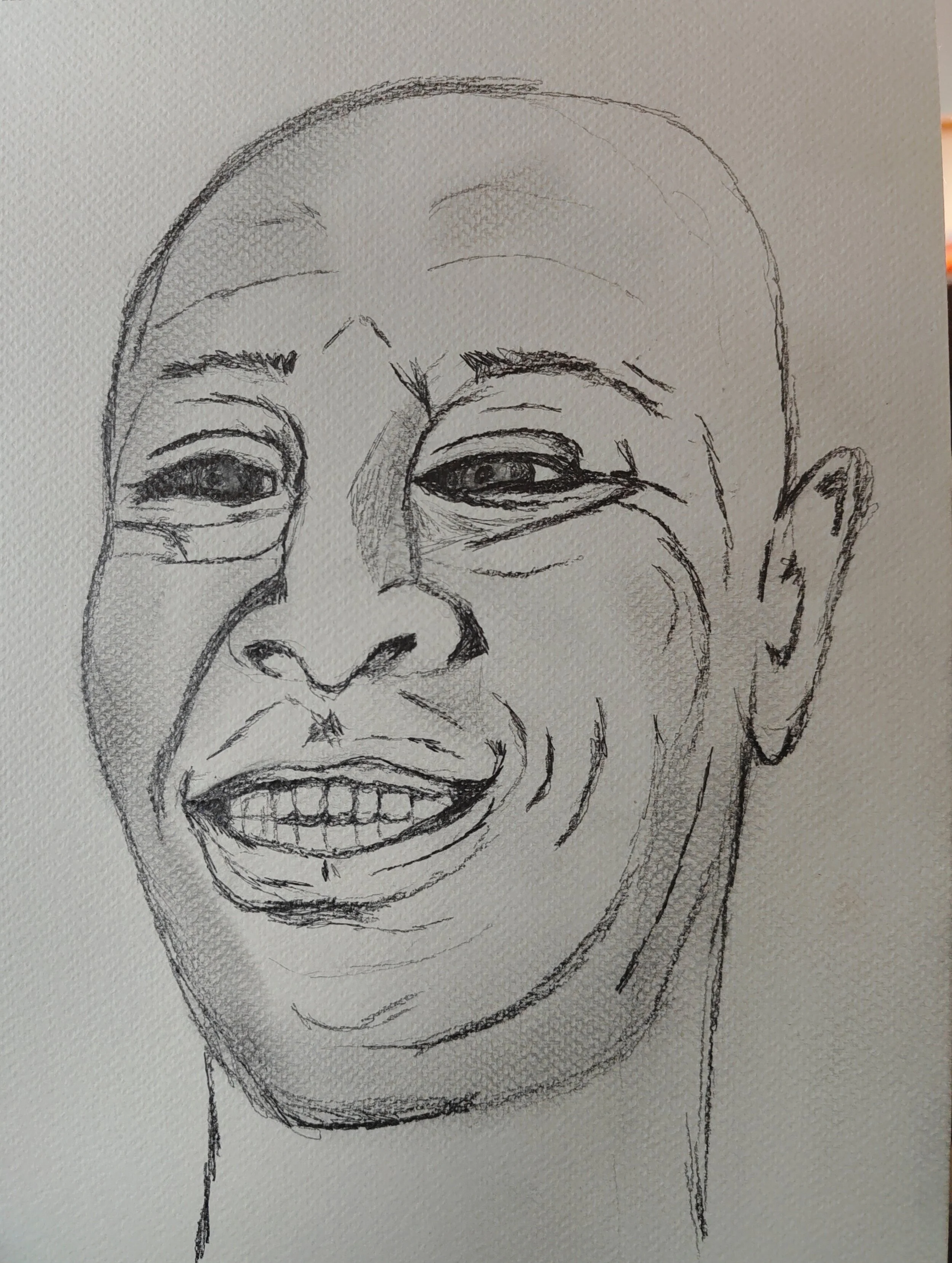 Sketch of a smiling person with a bald head and Asian features.