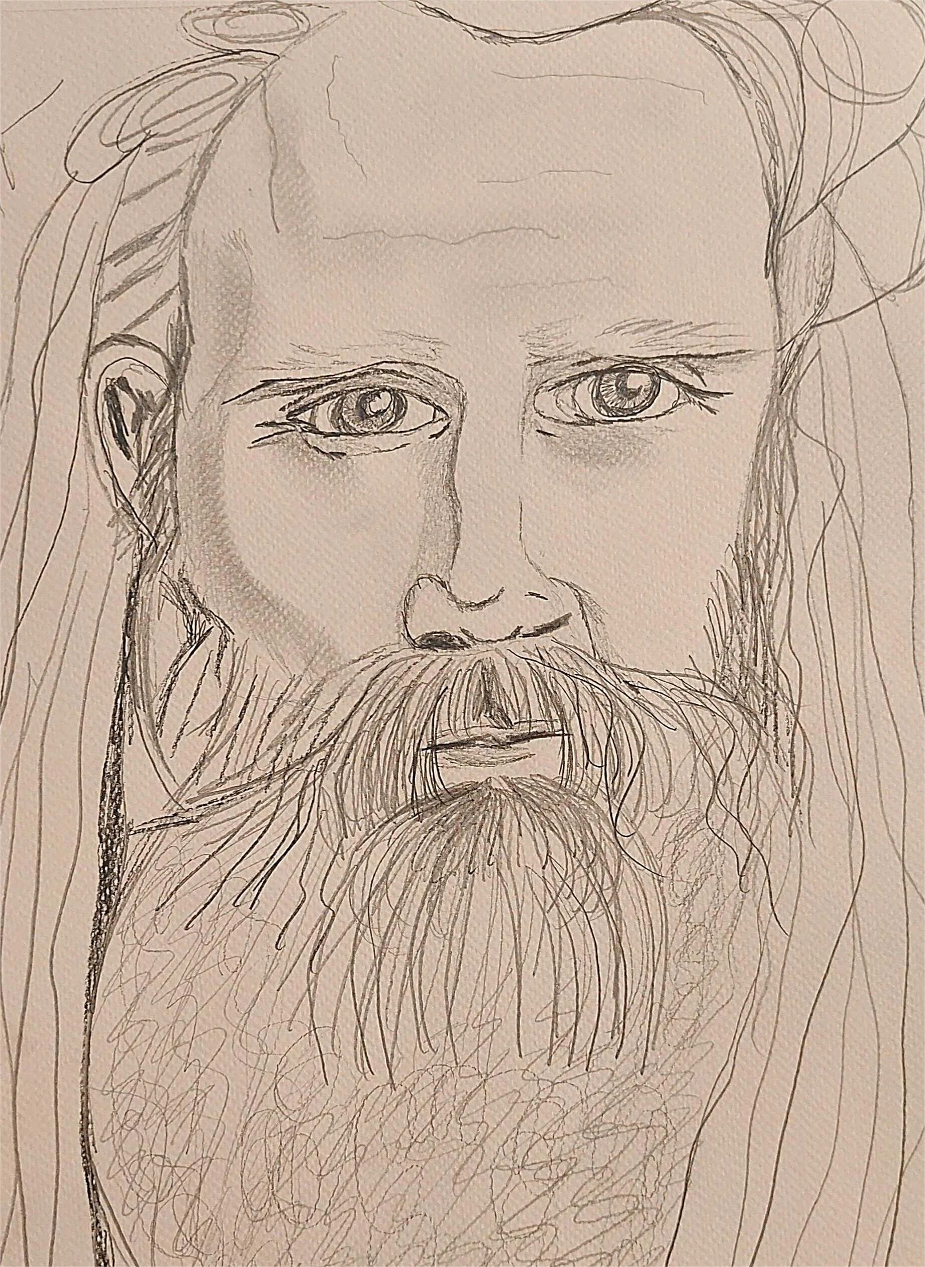 Sketch of a bearded man's face with detailed eyes, nose, and mouth, with long hair.