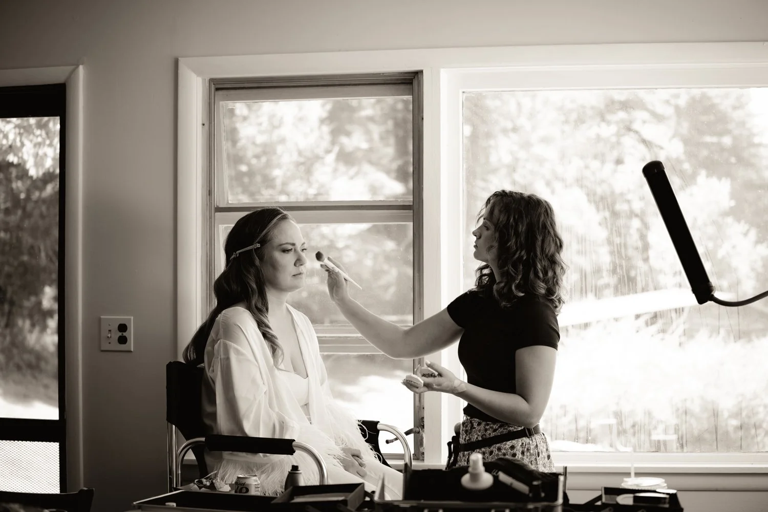makeup-artist-at-window-wedding-day.jpg