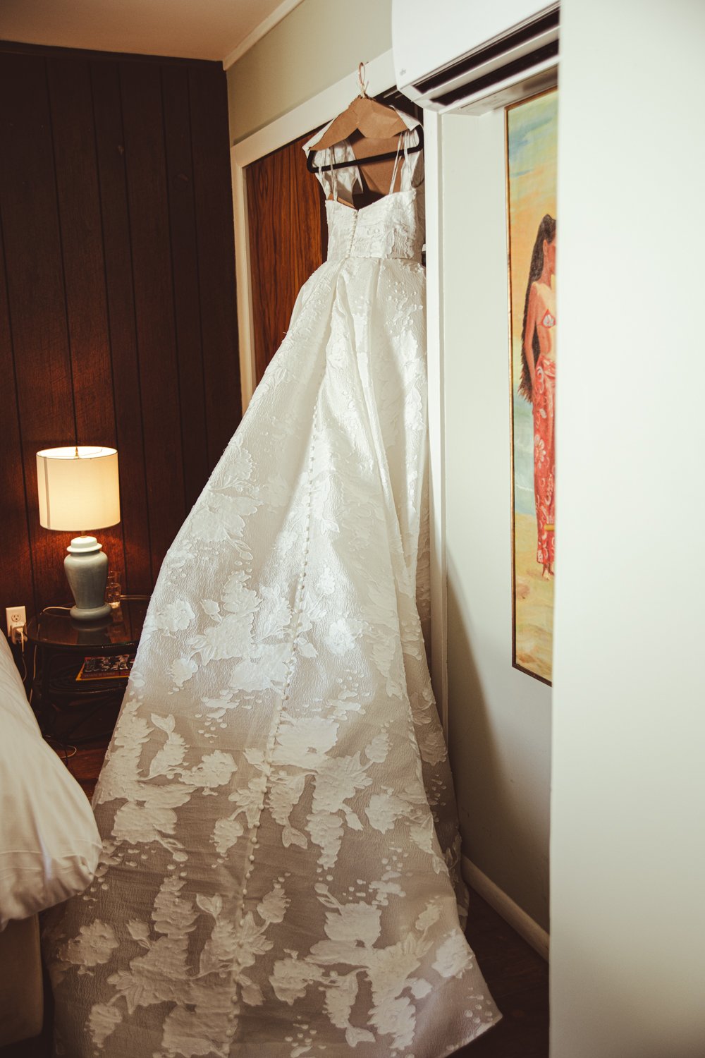 wedding-dress-hanging-on-hanger.jpg