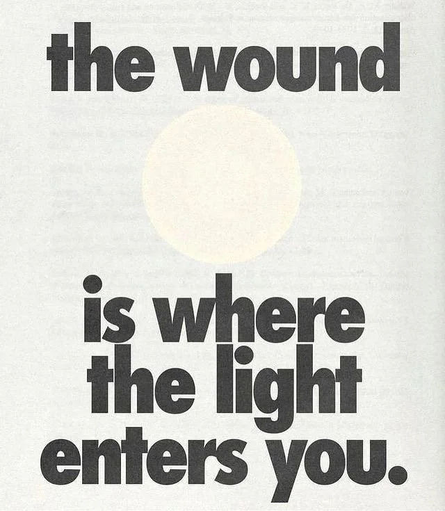 Quote on a white background: 'The wound is where the light enters you,' with a small light circle symbol above the text.