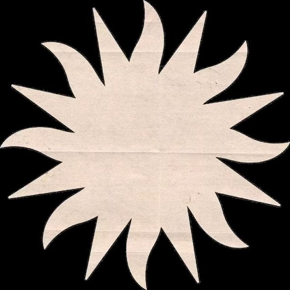 Paper cutout in the shape of a star with jagged edges, placed against a black background.