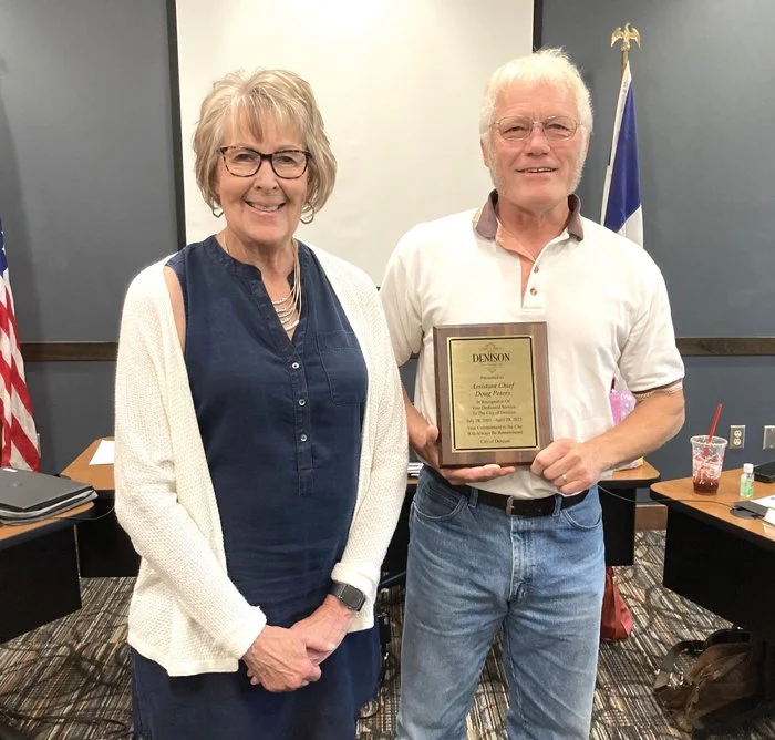 Peters honored for service to police department — The Denison Free