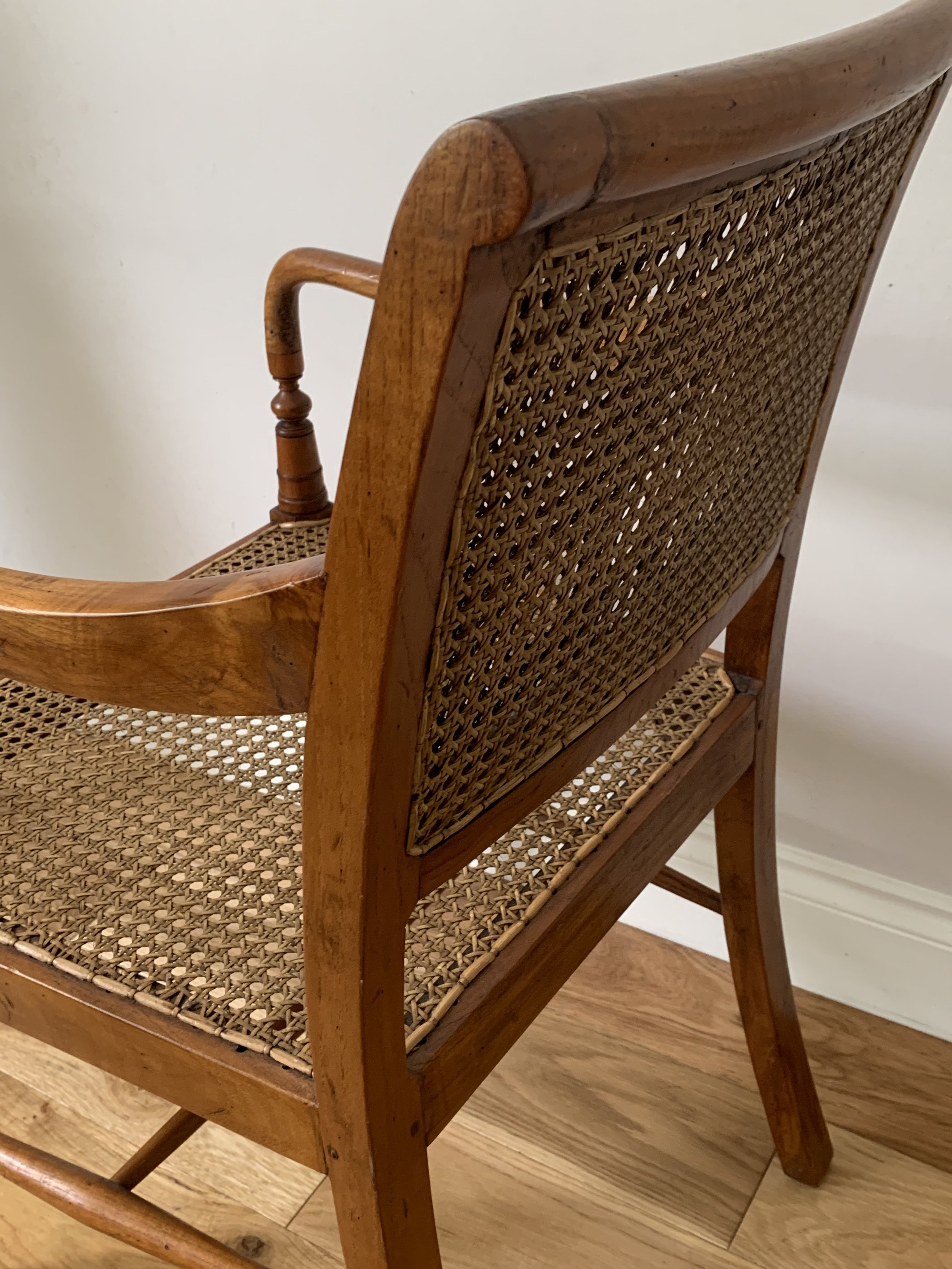 Secondhand vintage caned armchair