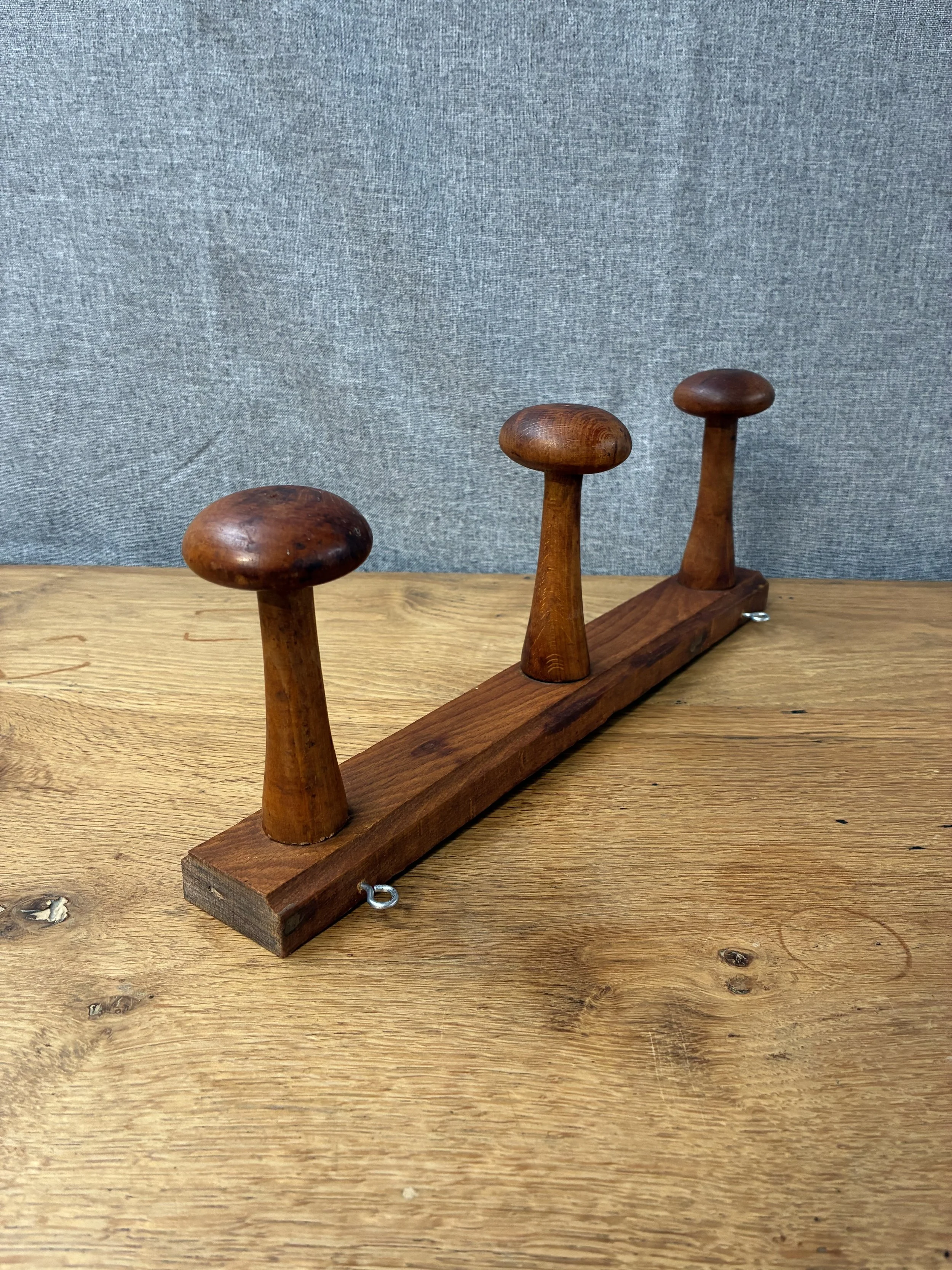 Secondhand vintage wall-mounted rack