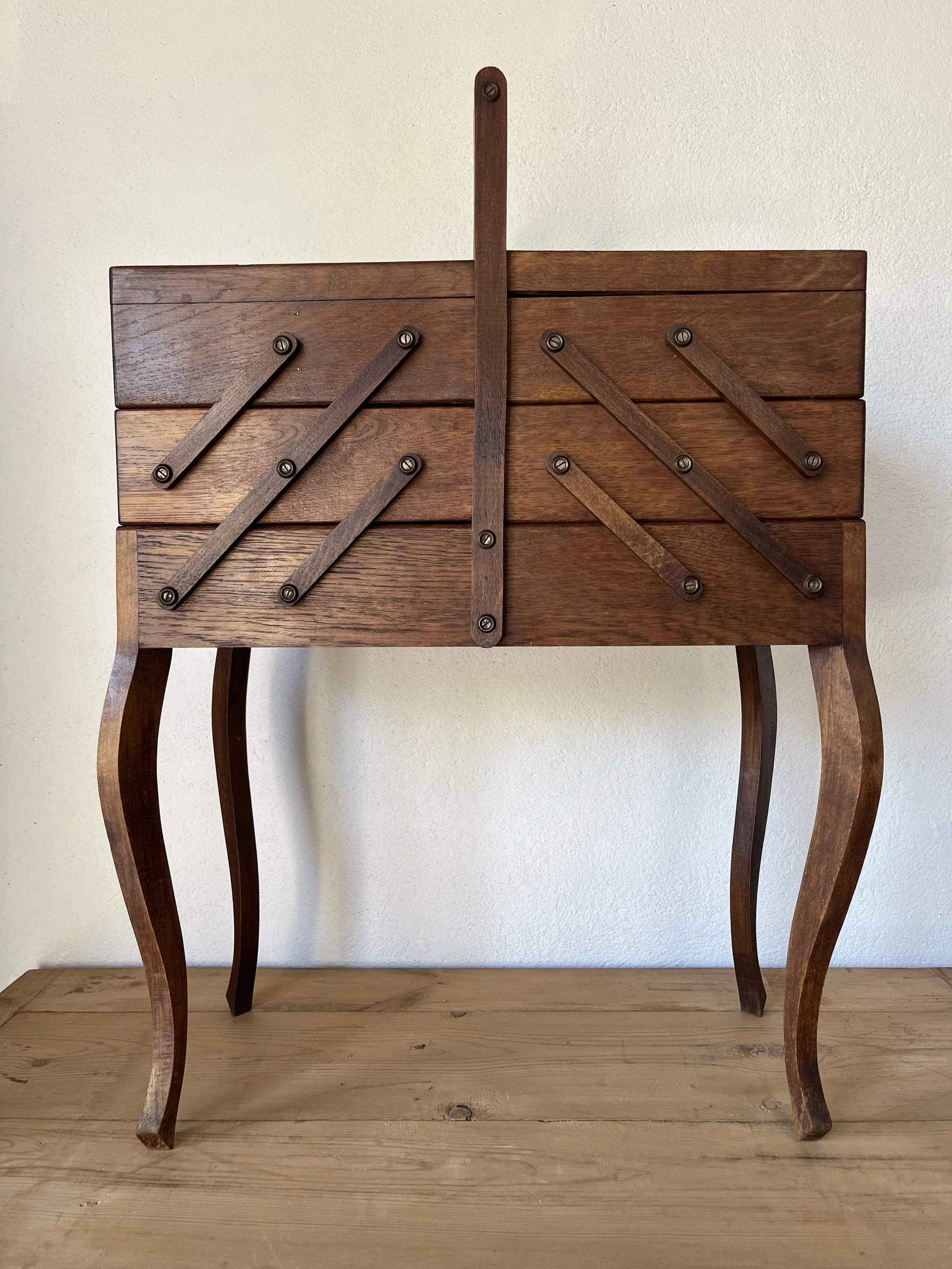 Secondhand vintage sewing box on legs