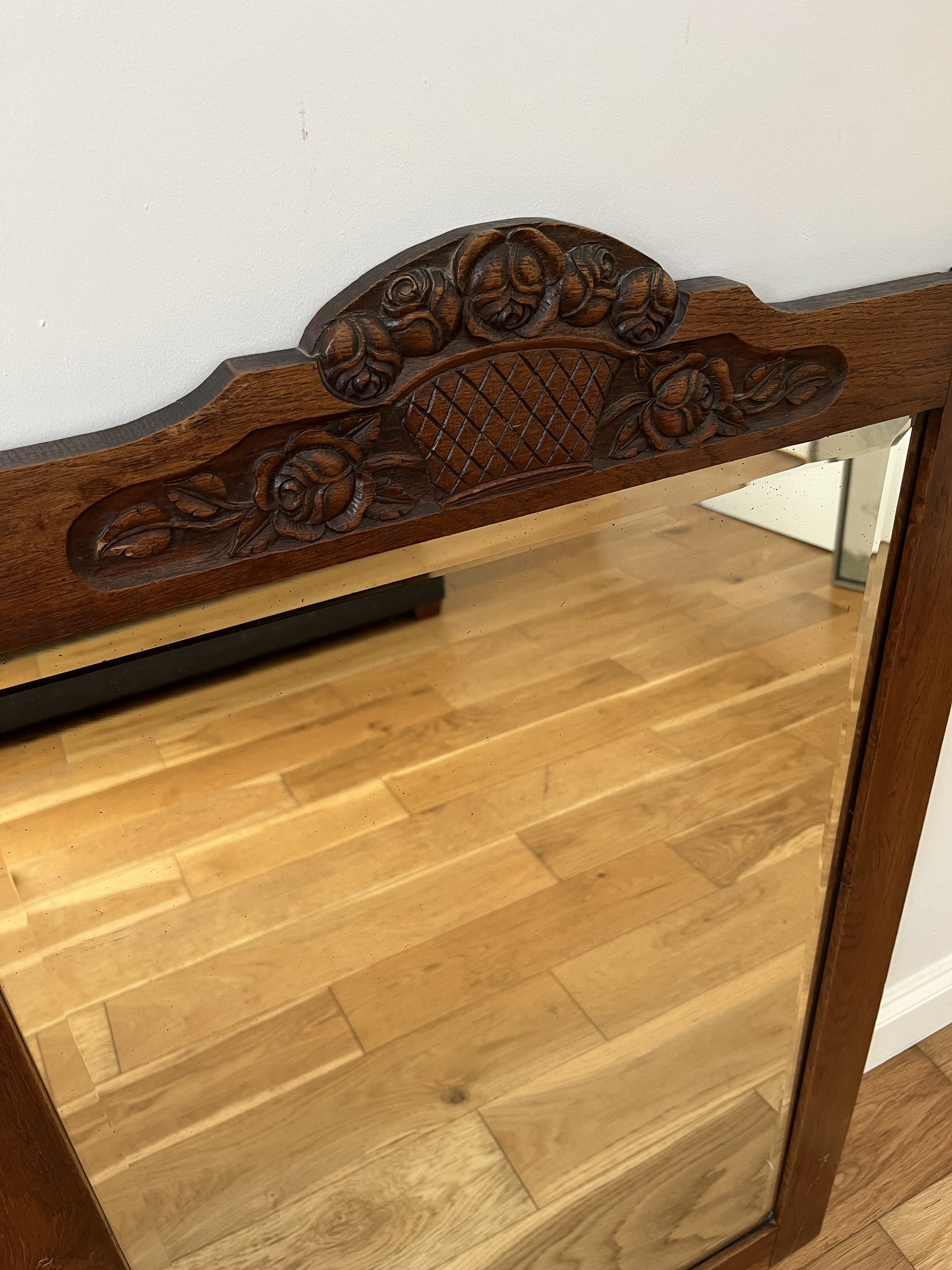 Secondhand vintage large beveled mirror in wooden frame