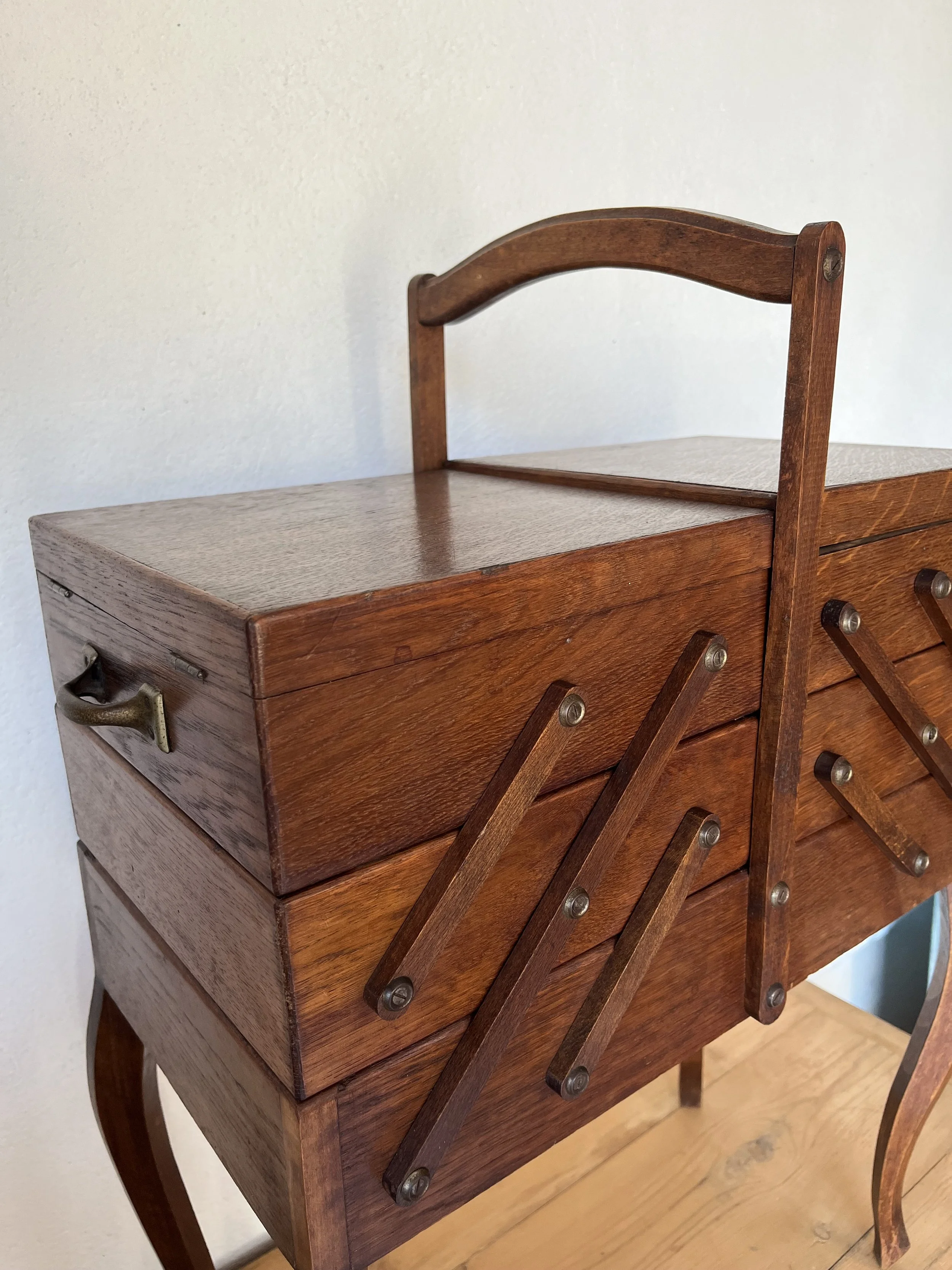 Secondhand vintage sewing box on legs