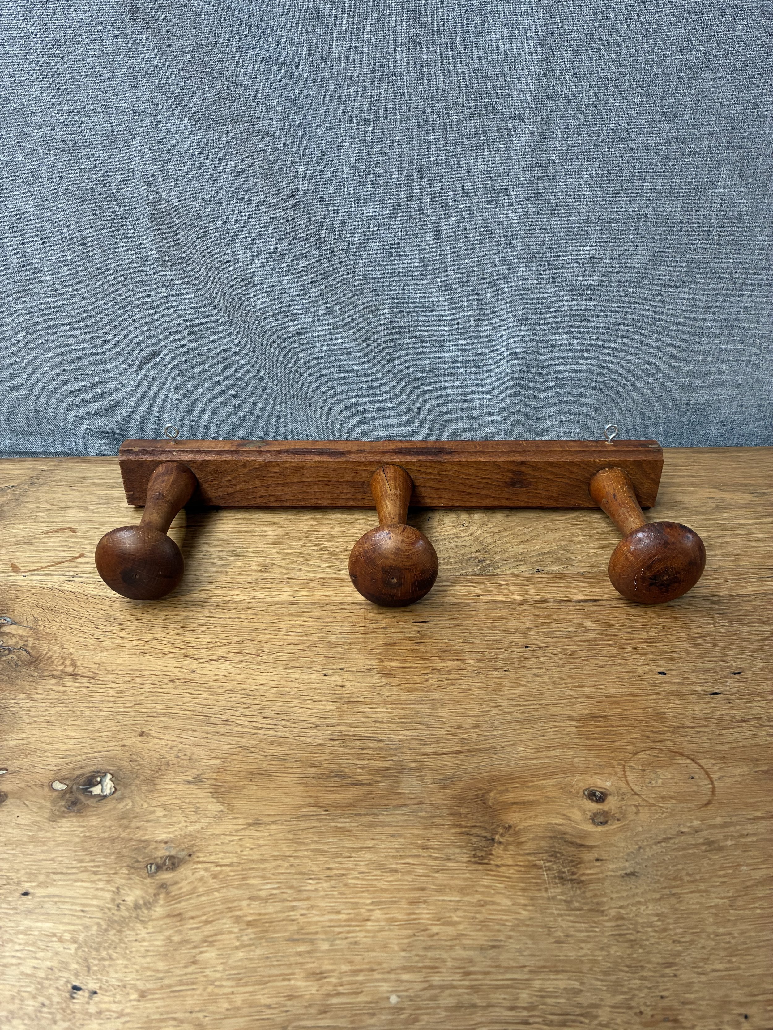 Secondhand vintage wall-mounted rack