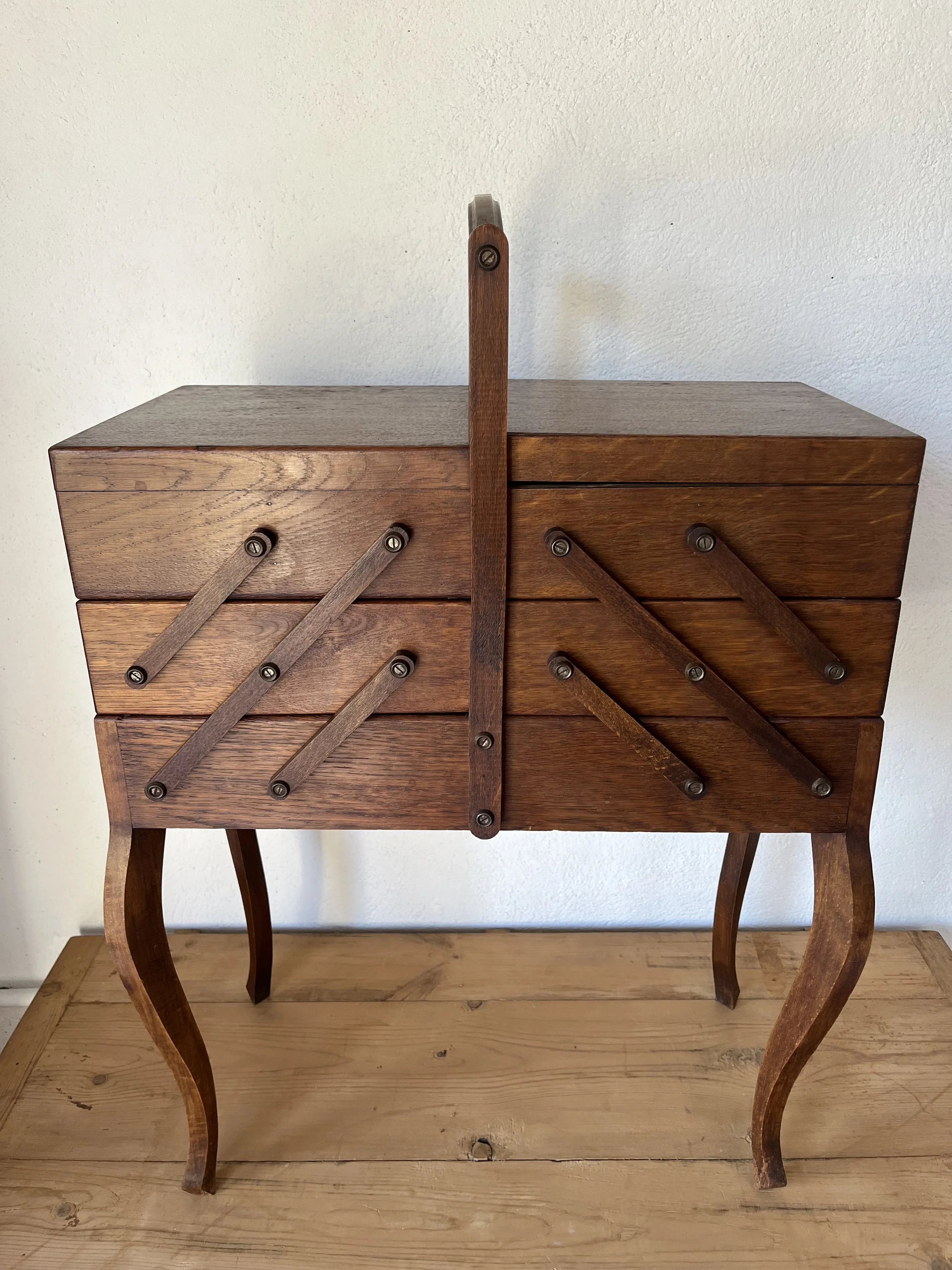Secondhand vintage sewing box on legs
