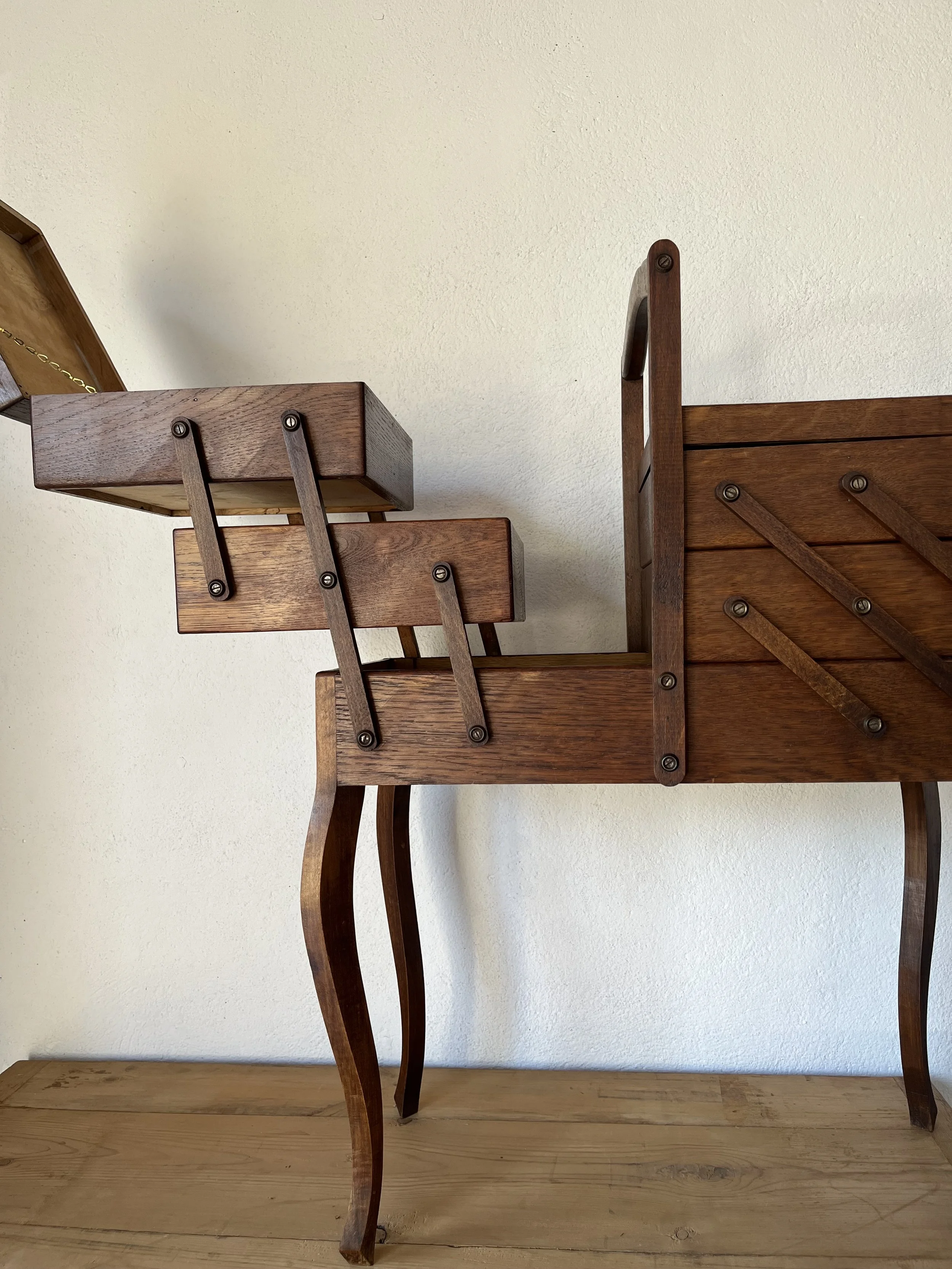 Secondhand vintage sewing box on legs