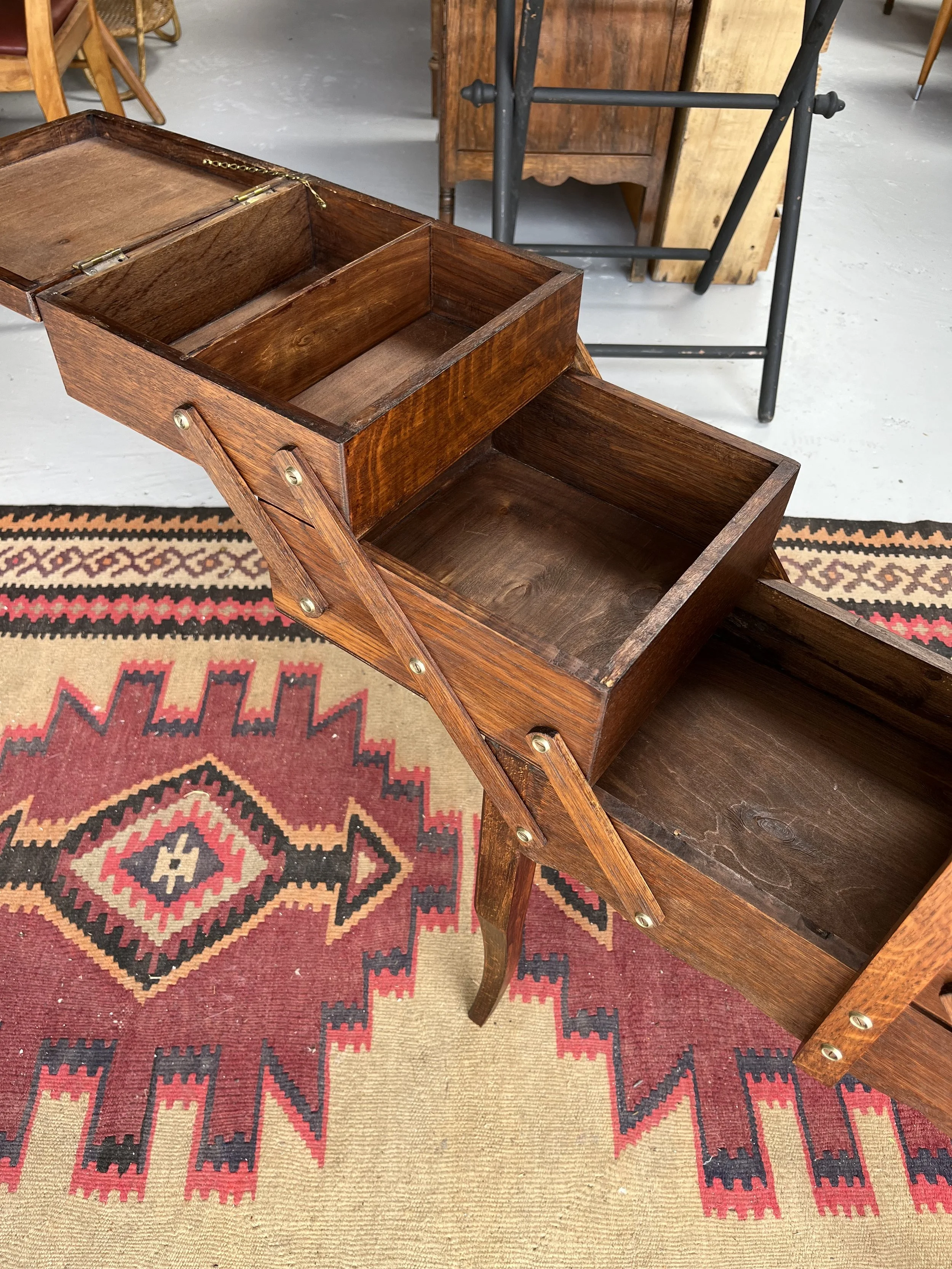 Secondhand vintage sewing box on legs