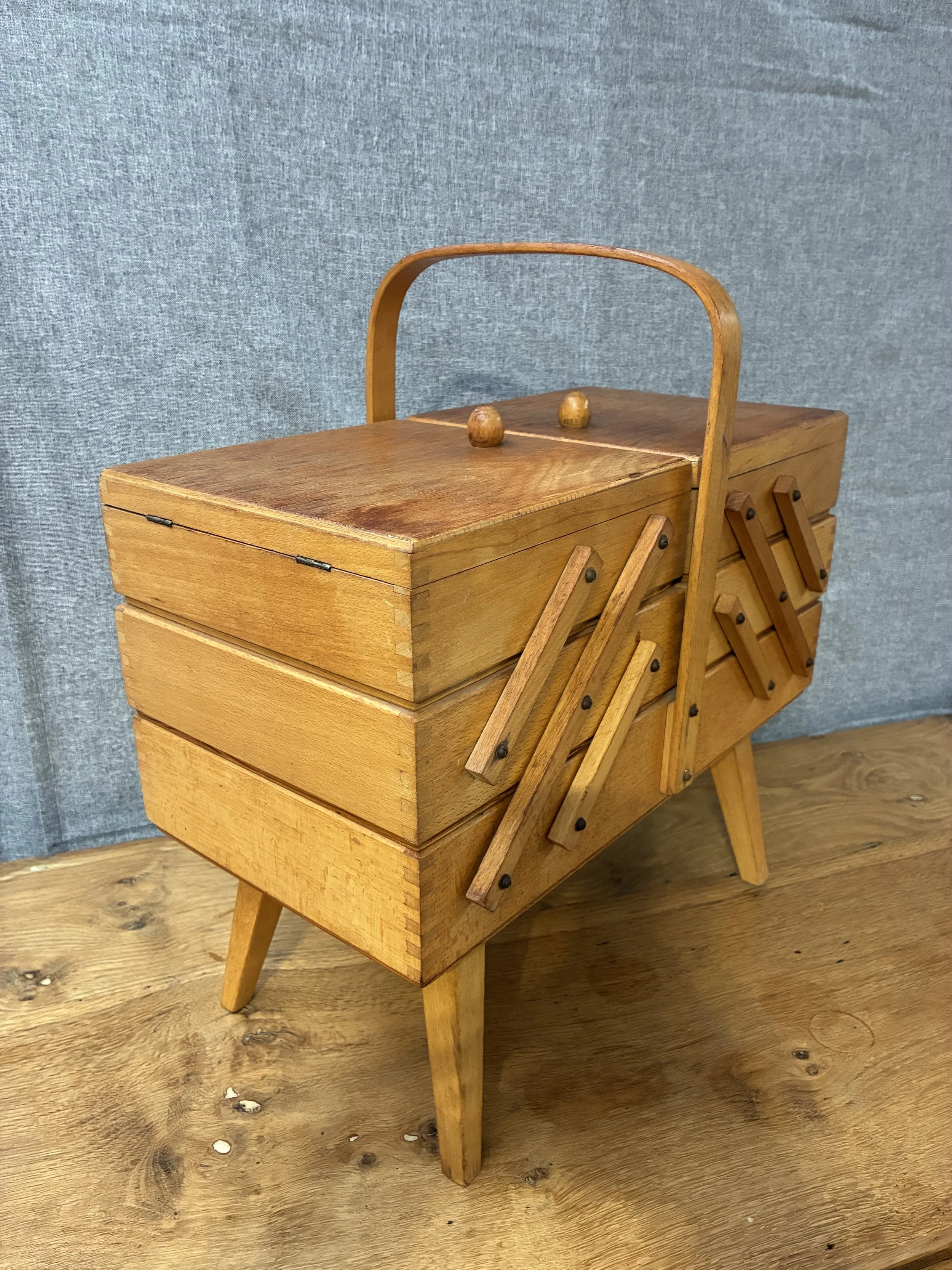 Secondhand vintage sewing box on legs
