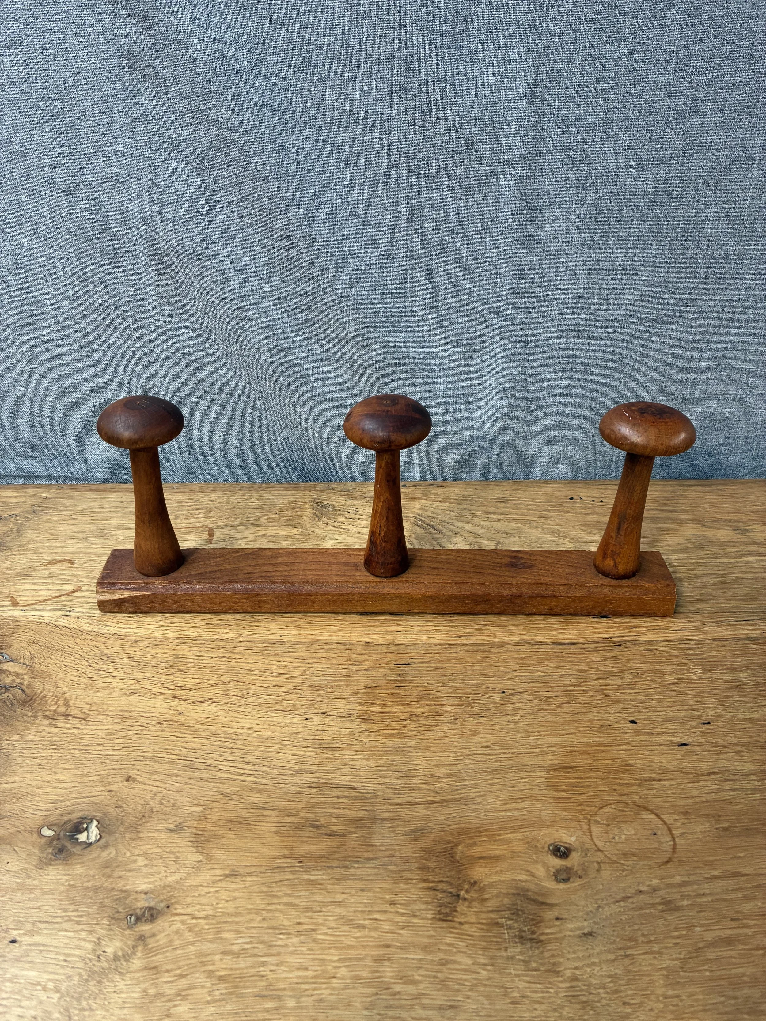 Secondhand vintage wall-mounted rack