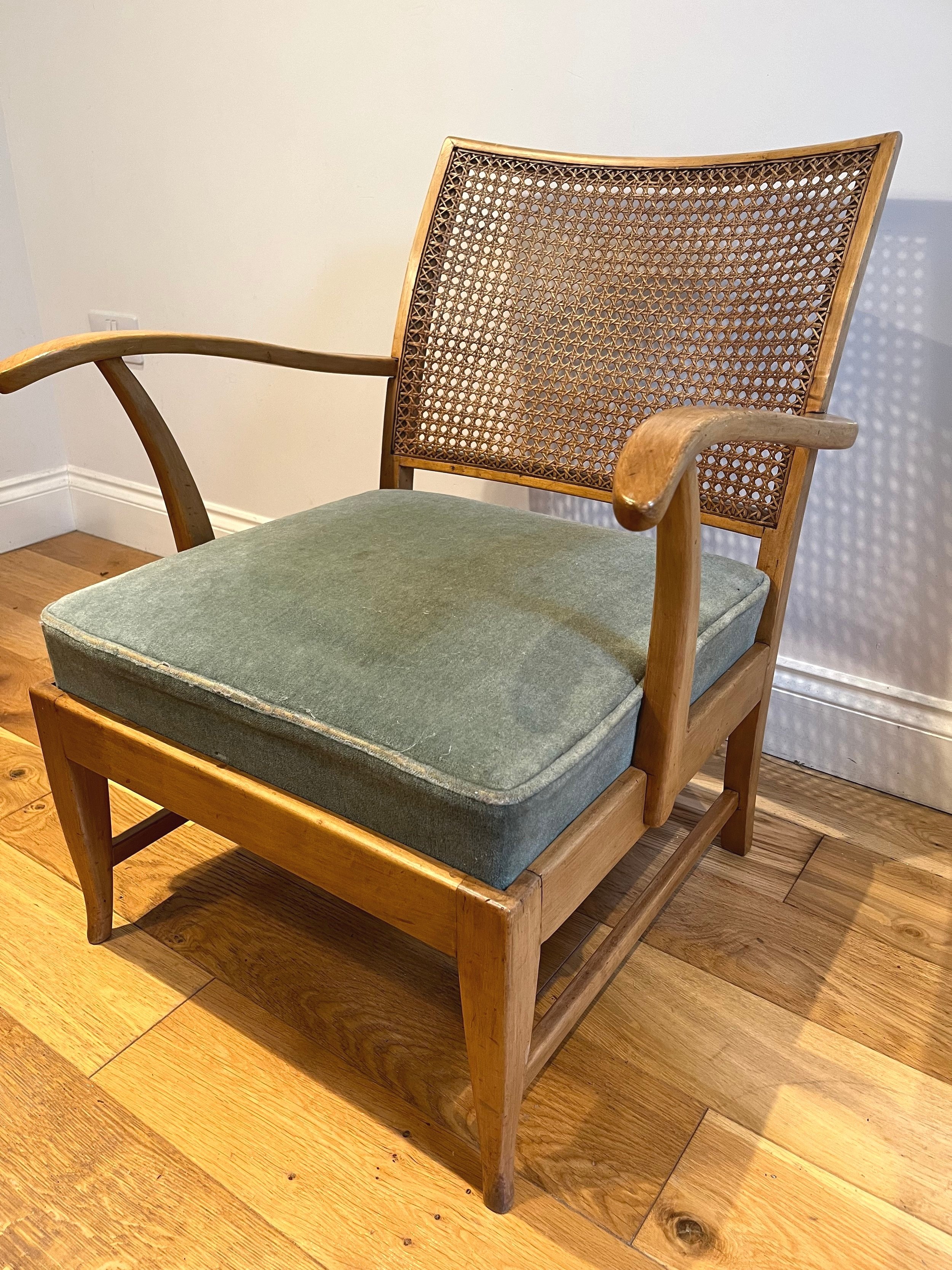 Secondhand vintage velvet caned armchair