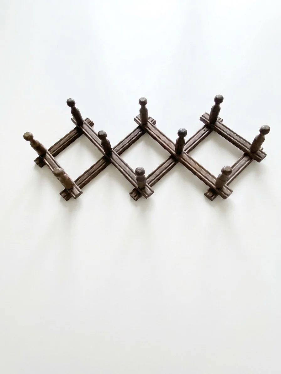 Secondhand vintage accordion wall rack