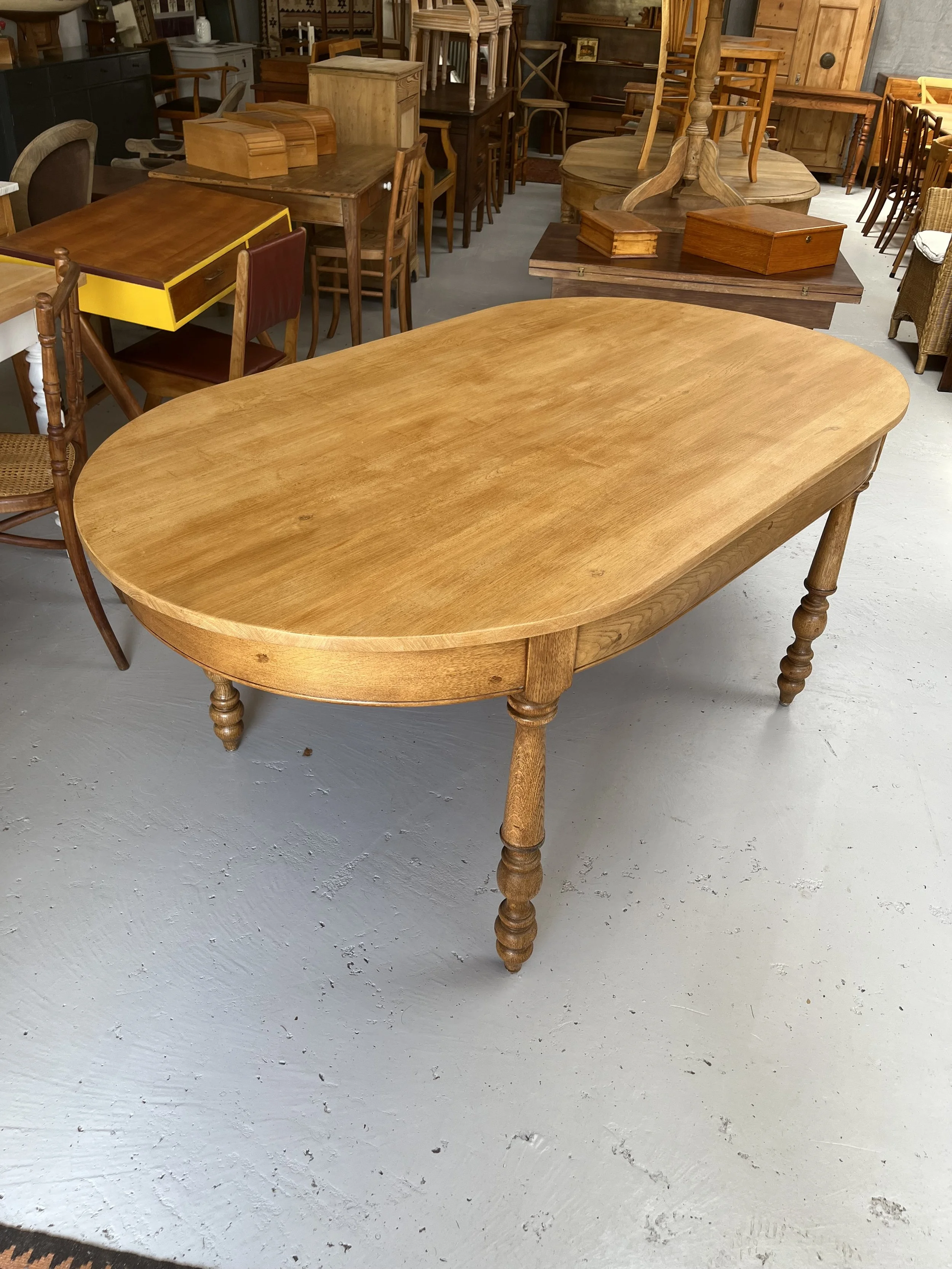 Secondhand vintage oval dining table