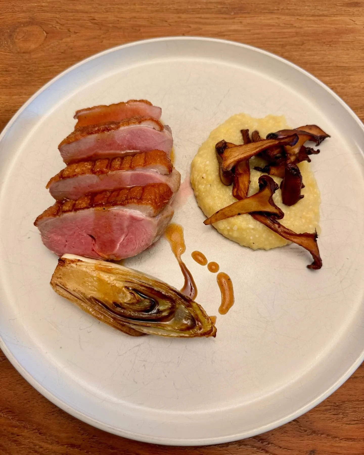 Pan seared duck breast with date and chili reduction polenta and chanterelles. 
.
.
.
.
.
.
#duck #libertyducks #newamericancuisine #yeschef