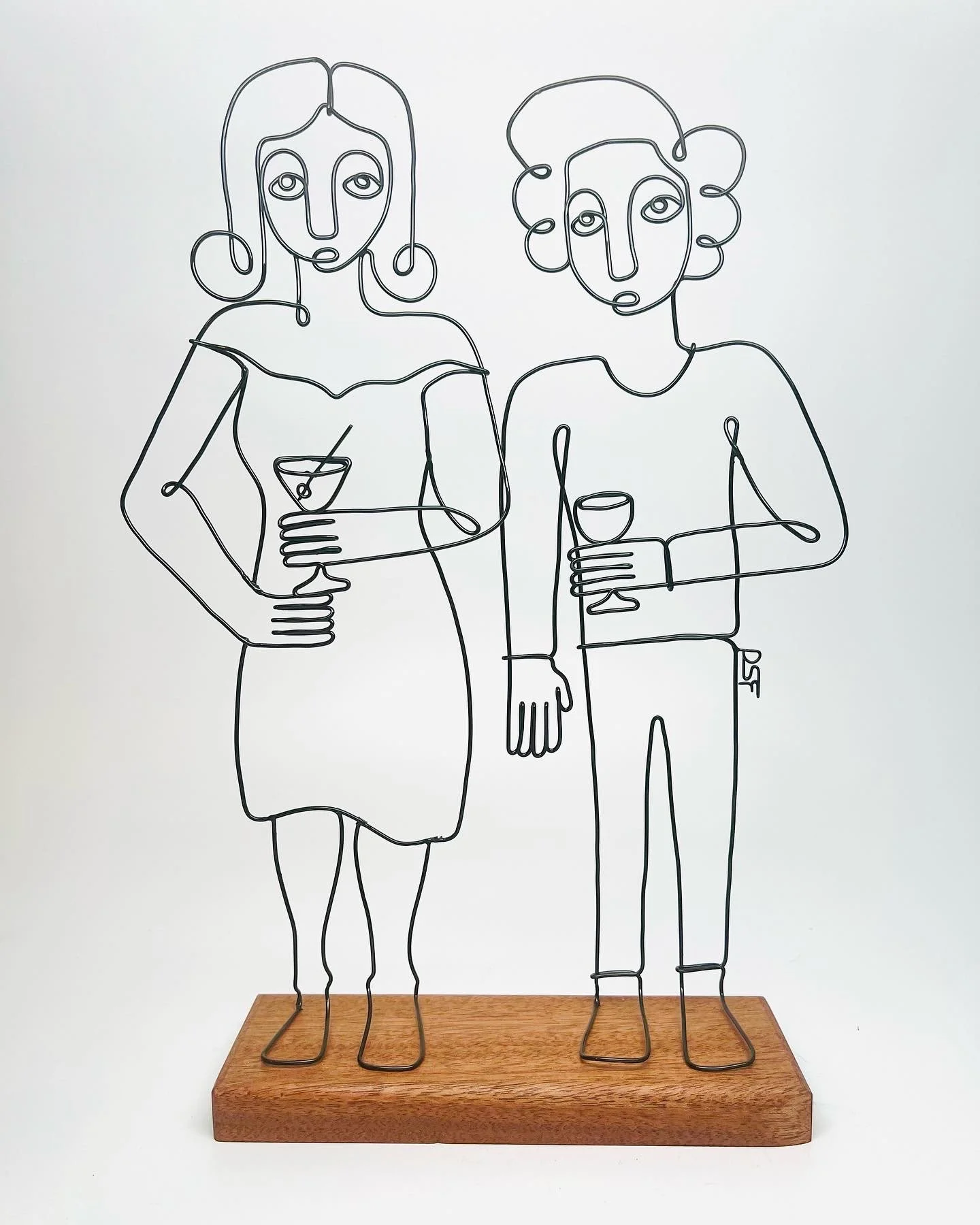The Collectors, 2023, powder coated steel, mahogany, 8”x15”x2.75”