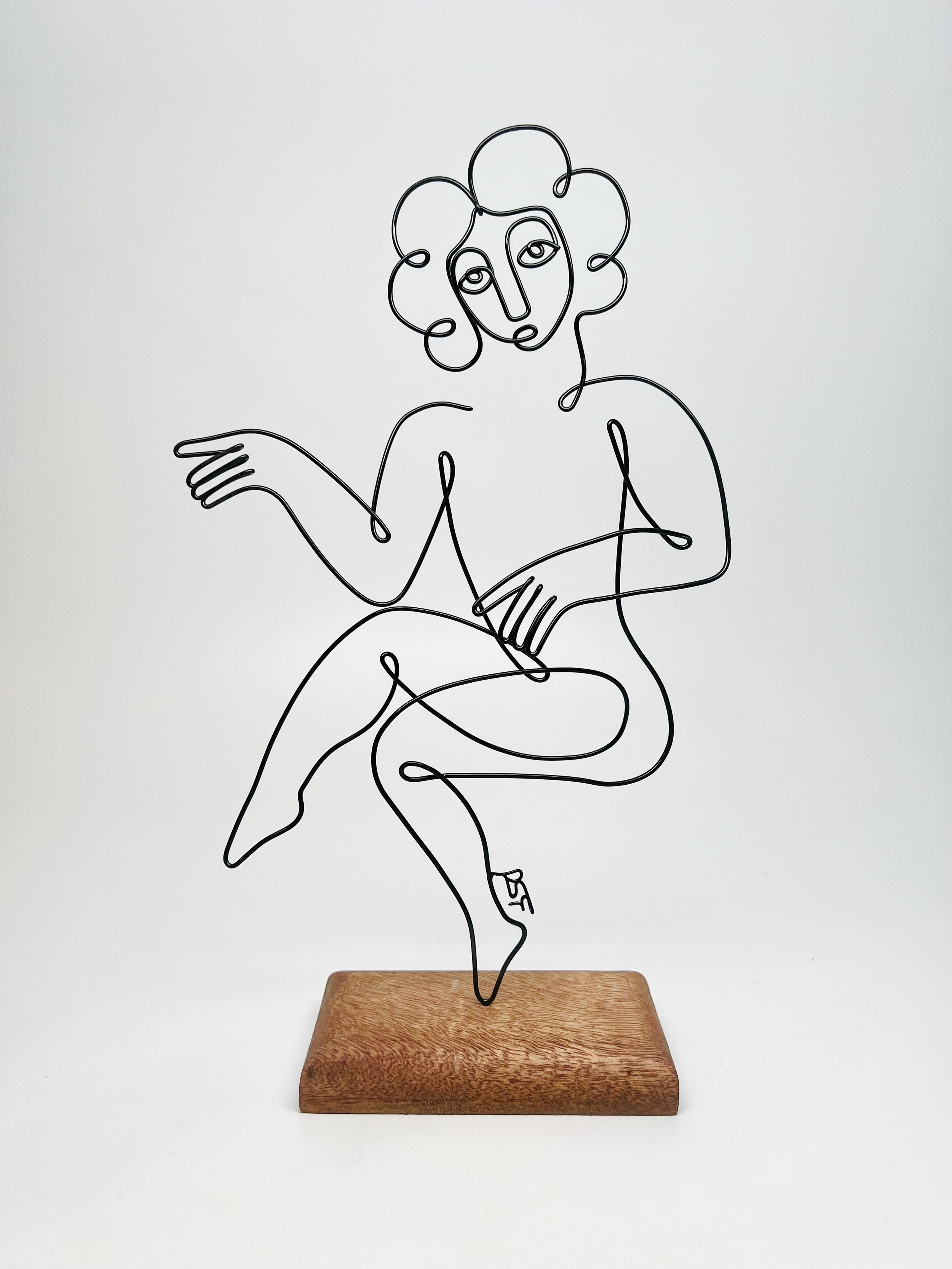 Dancer, 2023, powder coated steel, mahogany, 12.5”x7.5”x2.5”