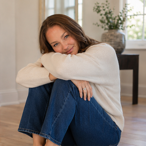 Elizabeth Boyer, LMFT, seated in her Downtown McKinney therapy office.