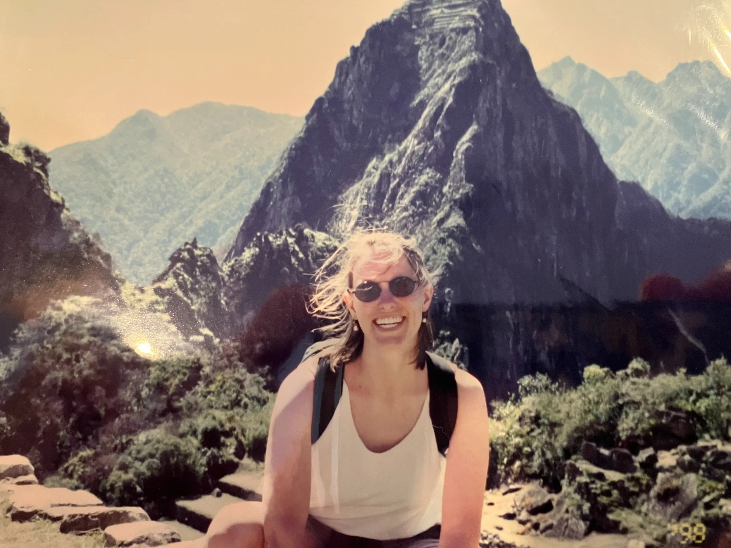 Holly McFarland, coach for young adults, hiking in the mountains