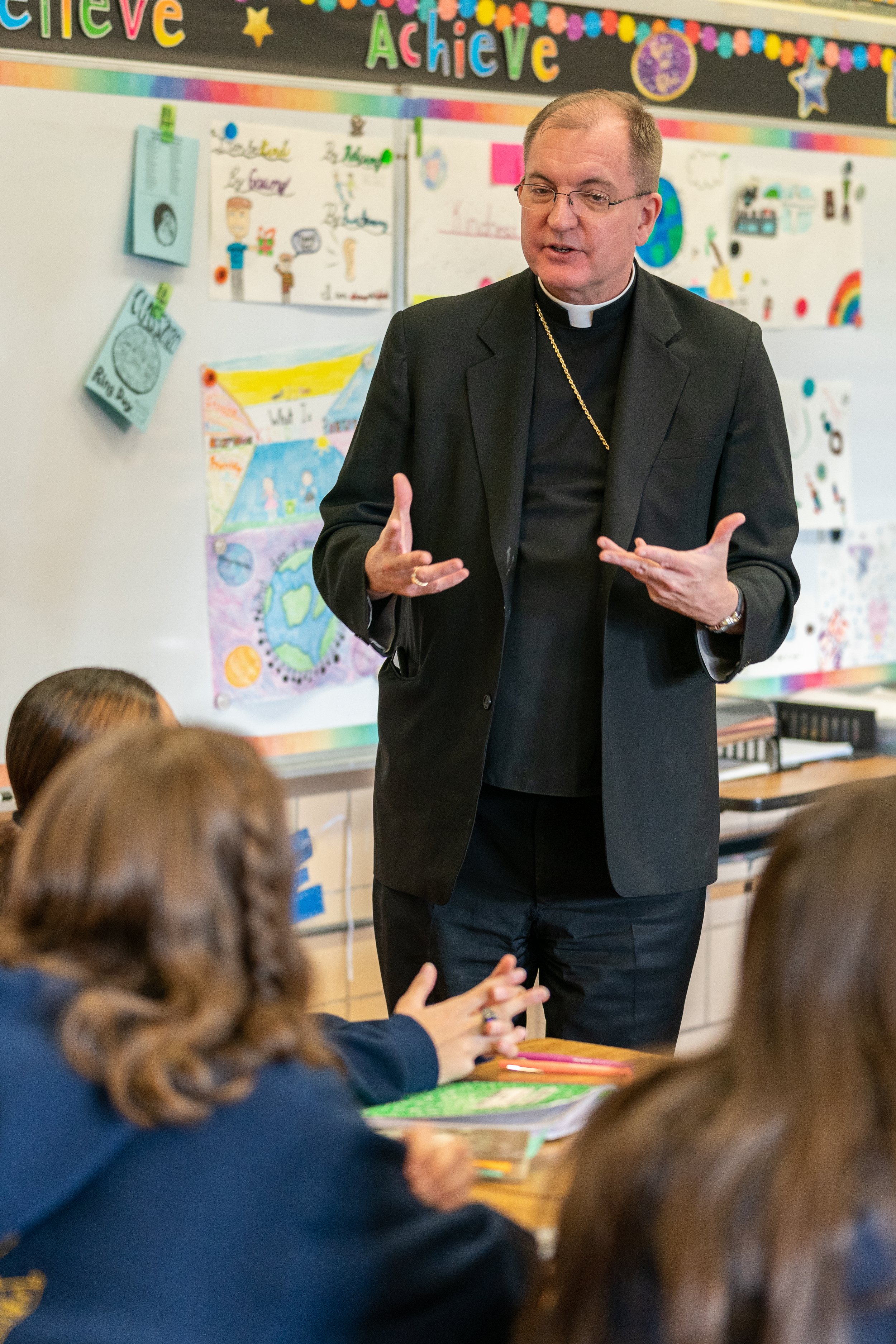 Bishop John Barres visiting students at Notre Dame School in New Hyde Park, NY.