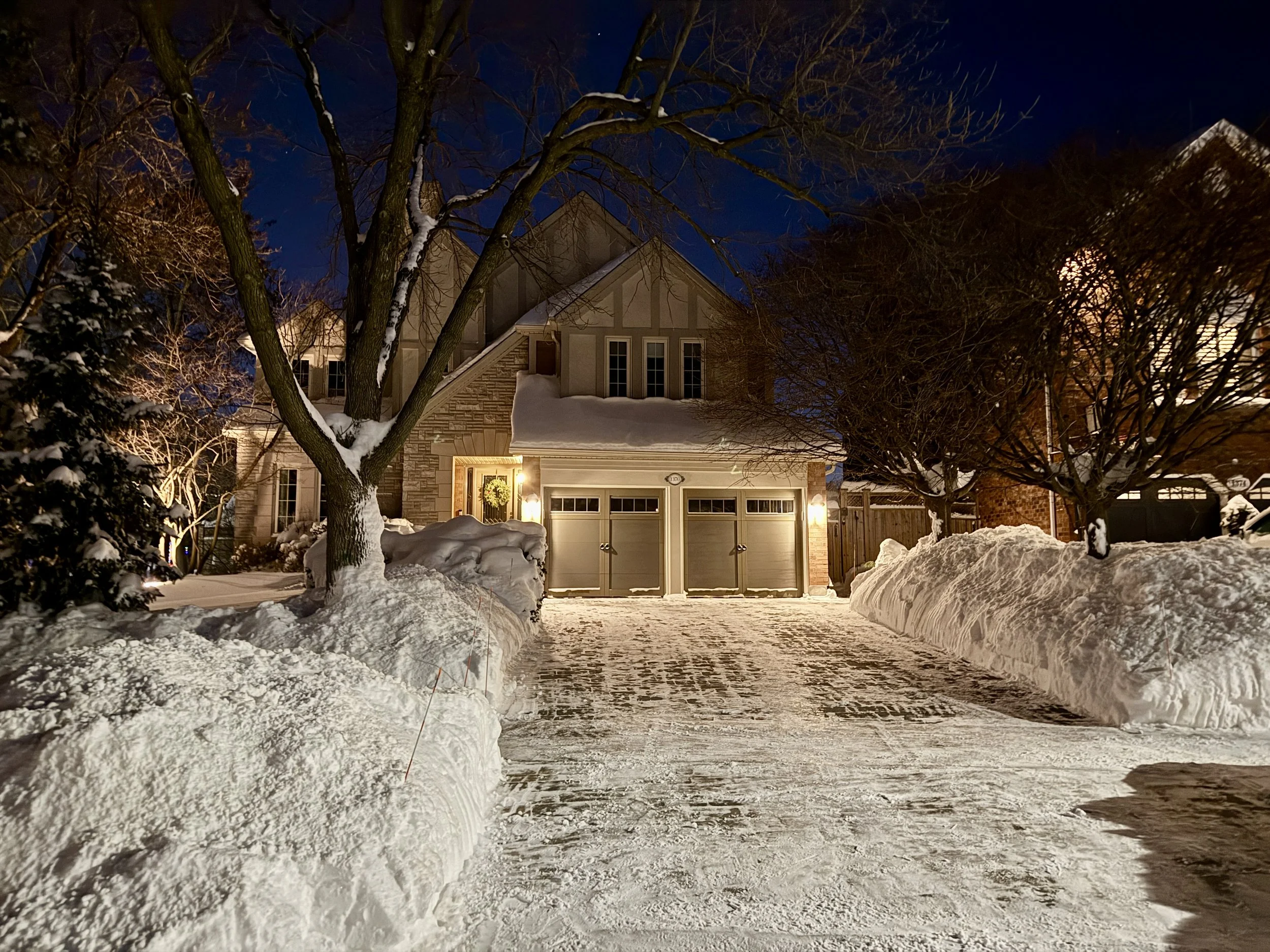 Driveway snow removal service at a Glen Abbey Oakville home