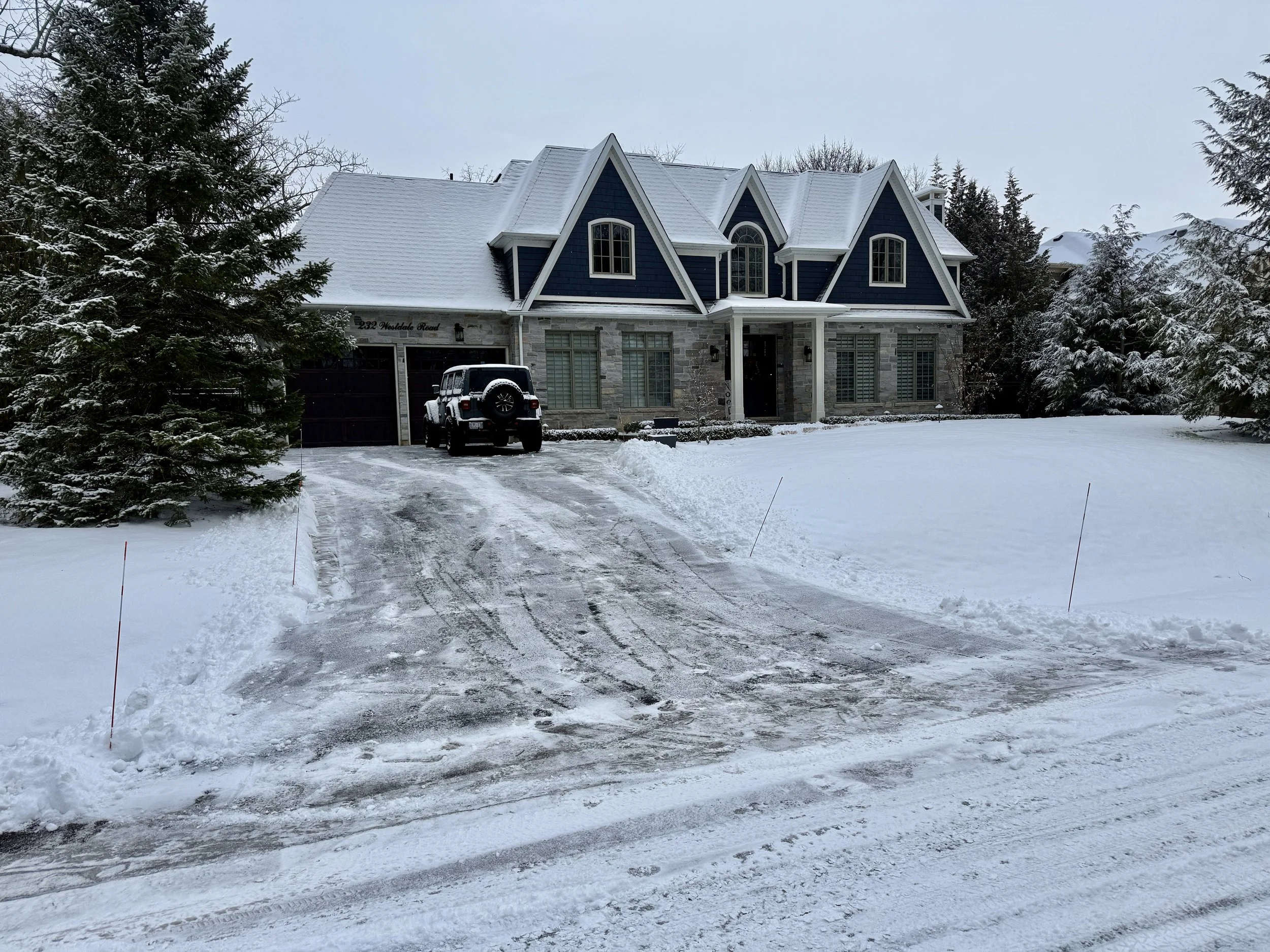 Snow shoveling and driveway clearing in South Oakville neighborhood