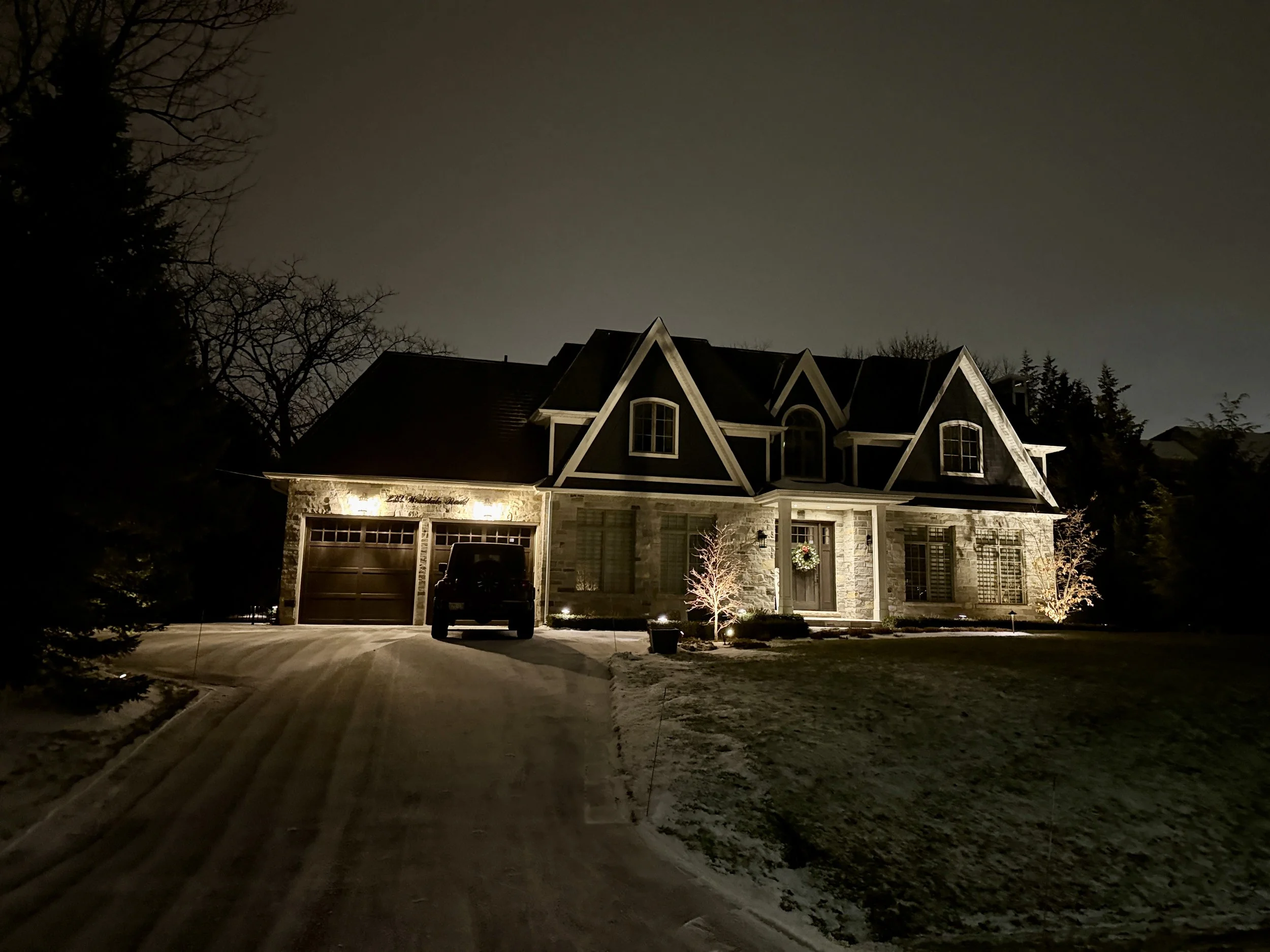 Oakville driveway snow removal using professional snow blower and hand shoveling