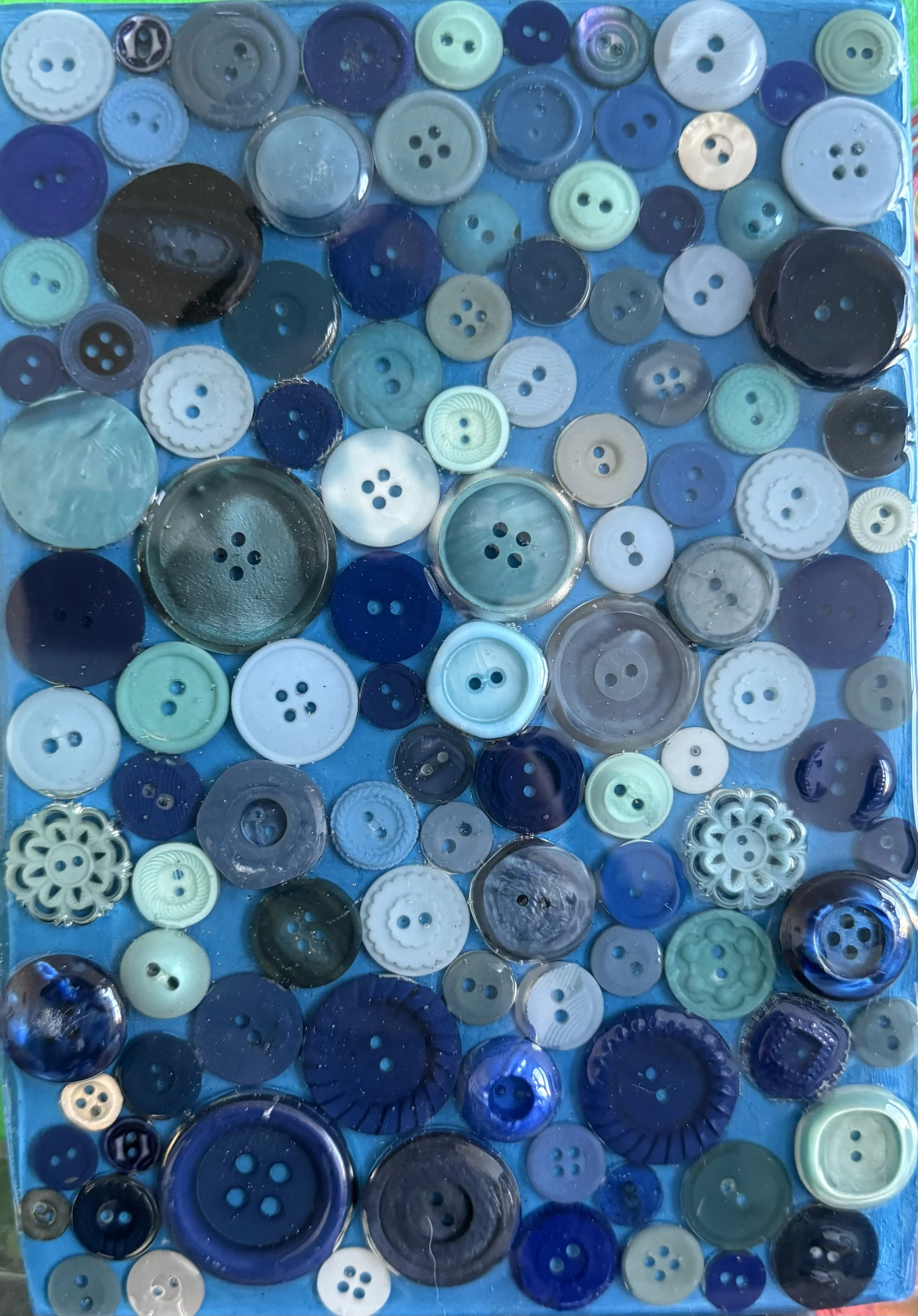 Blue Button by Lindsay Brenner