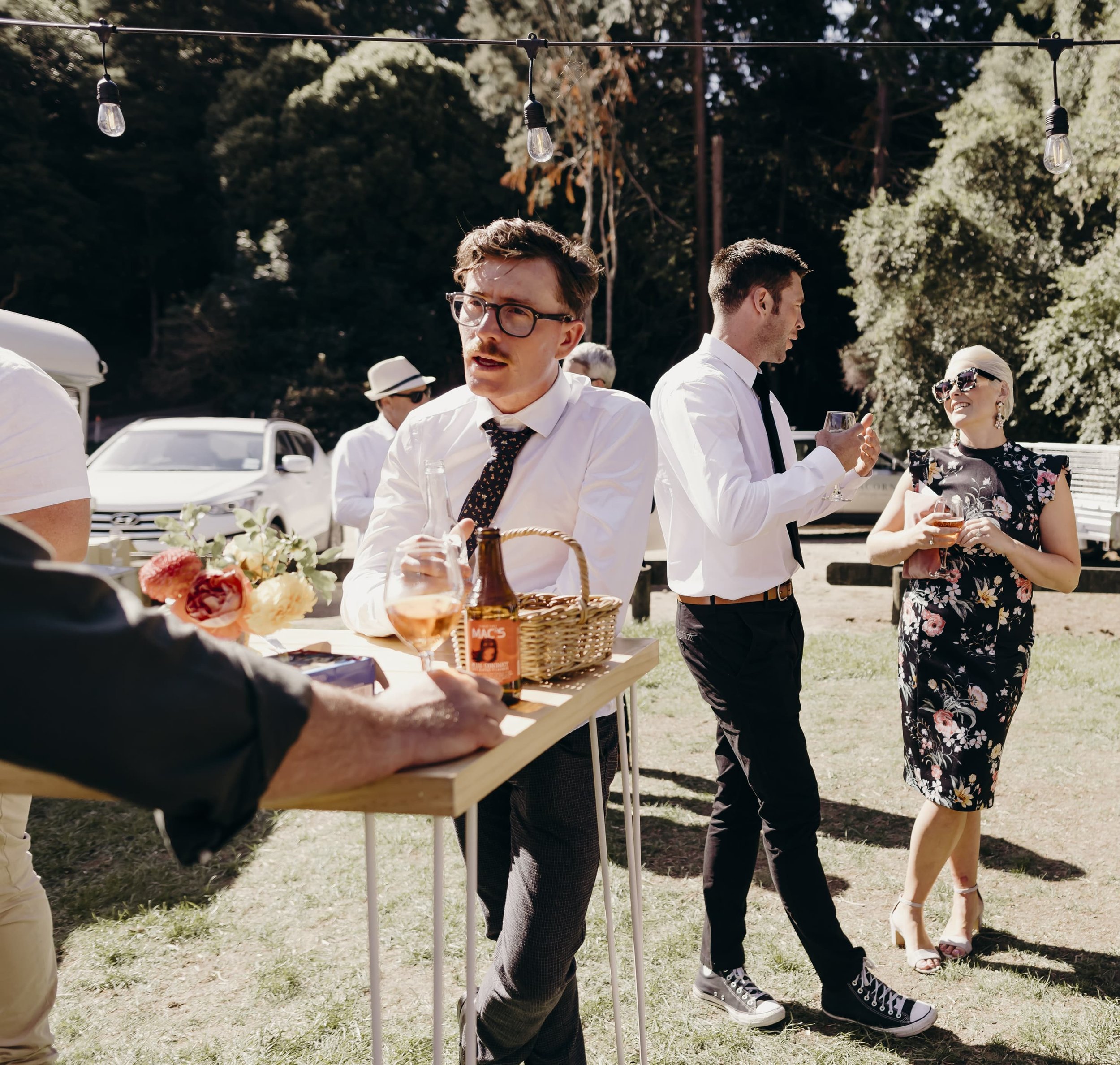 Event hire equipment Dunedin - large wooden bar leaner at wedding.jpg