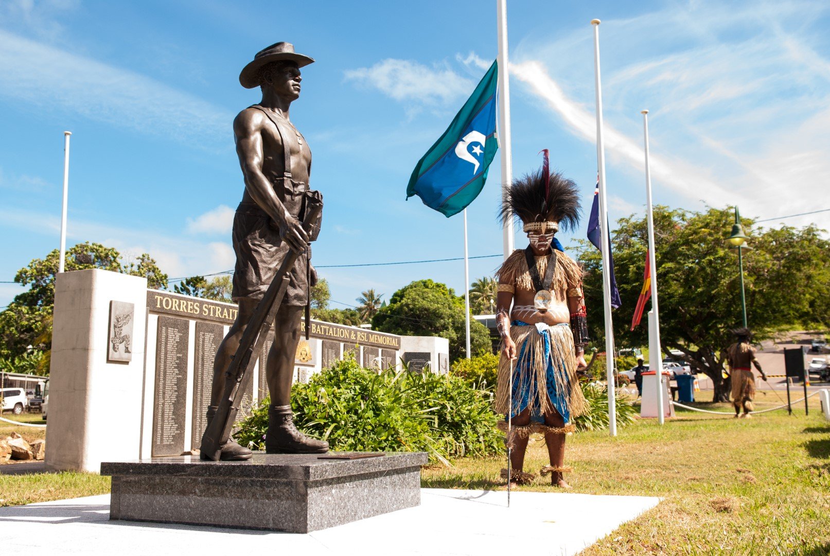 Anzac Day ceremony WW2 digger statue and Warrior (Large).jpg