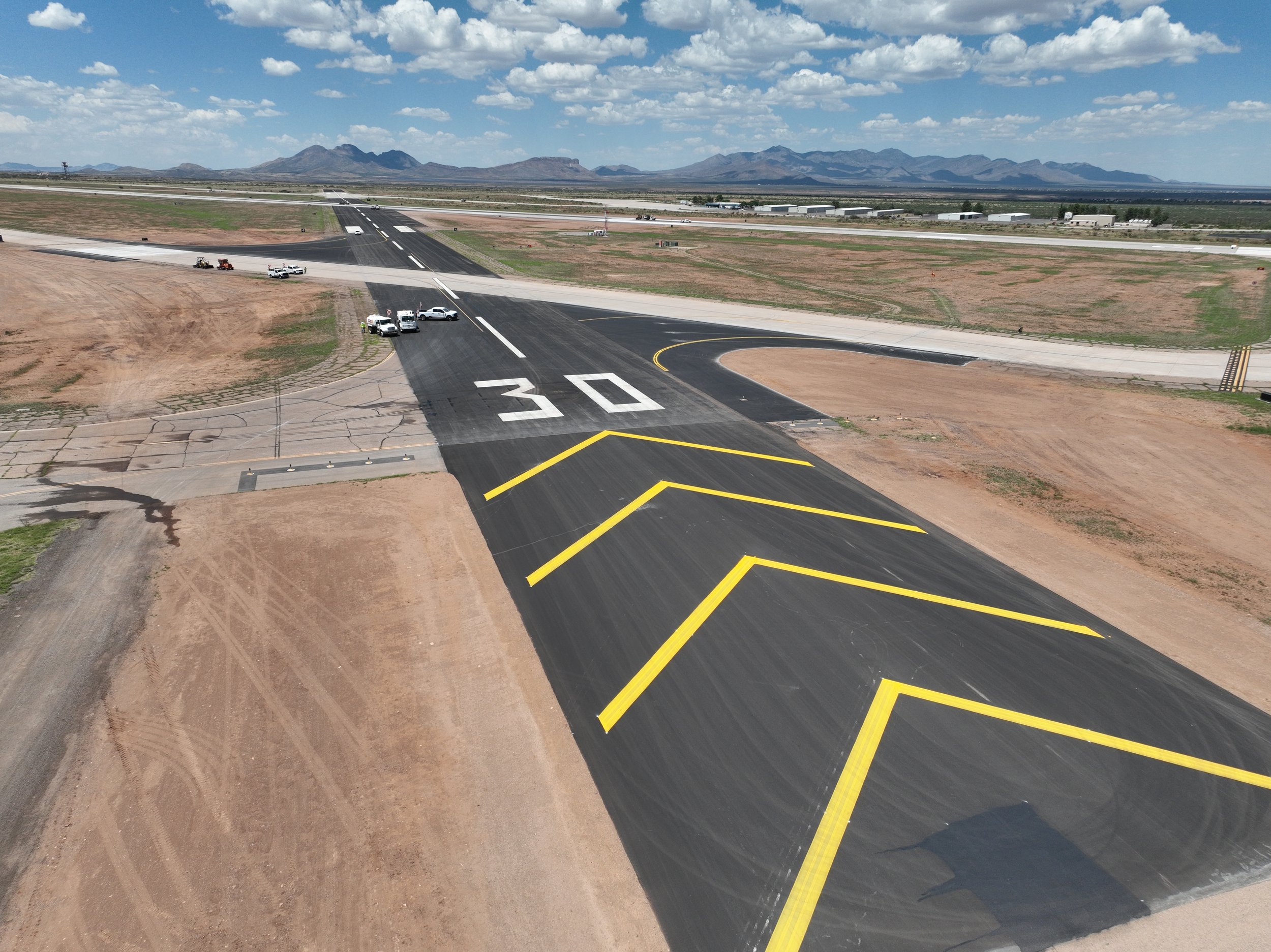 iSX crews paved airport runway at Libby Army Airfield, where the client required high-quality asphalt paving.