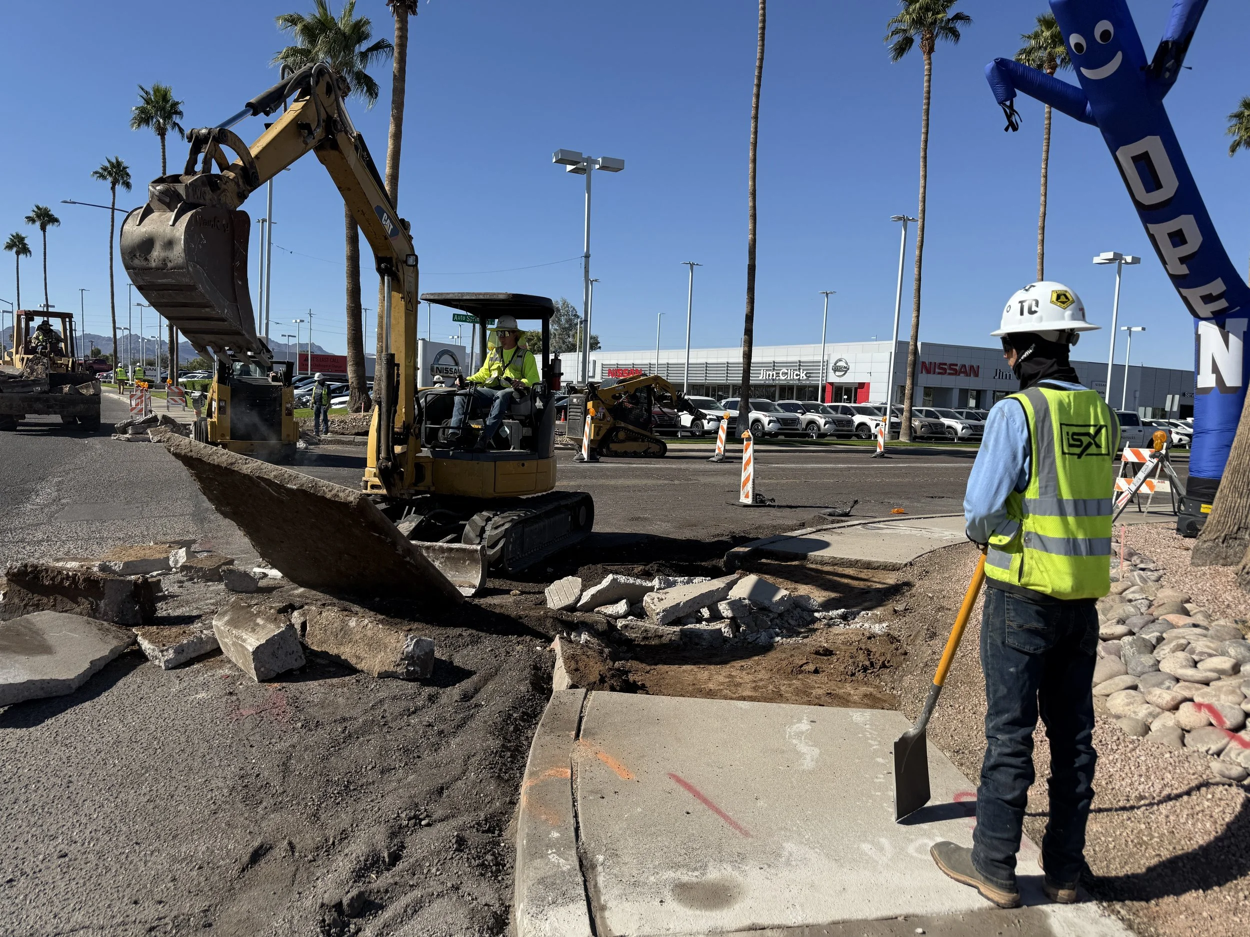 iSX Construction is removing concrete in preparation to build an ADA curb ramp