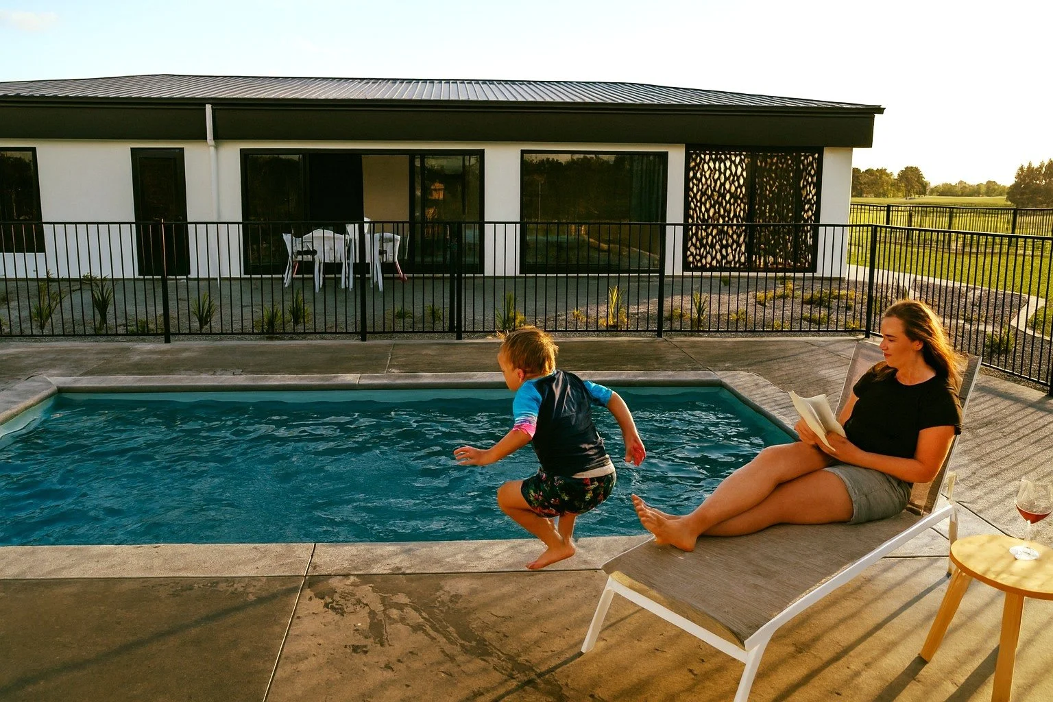 We don&rsquo;t just build houses, we create lifestyles.!!
Think sun-soaked days, kids by the pool, a lounger, a glass of wine, and your favourite book. 🏡☀️🍷📖

#Manawatu #Manawatū #PoolHomes #DreamHomes #CustomBuild #NewBuildNZ #OutdoorLiving #Fami