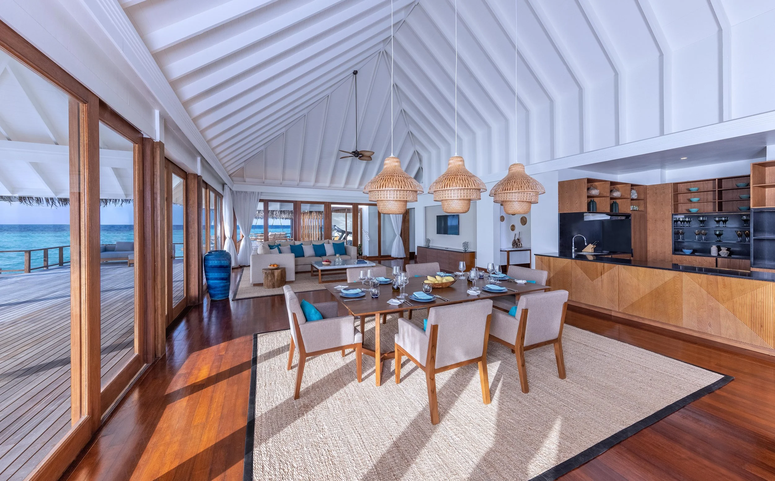 Anantara Kihavah Two-bedroom Sunset Over Water Pool Residence Dining area.jpg