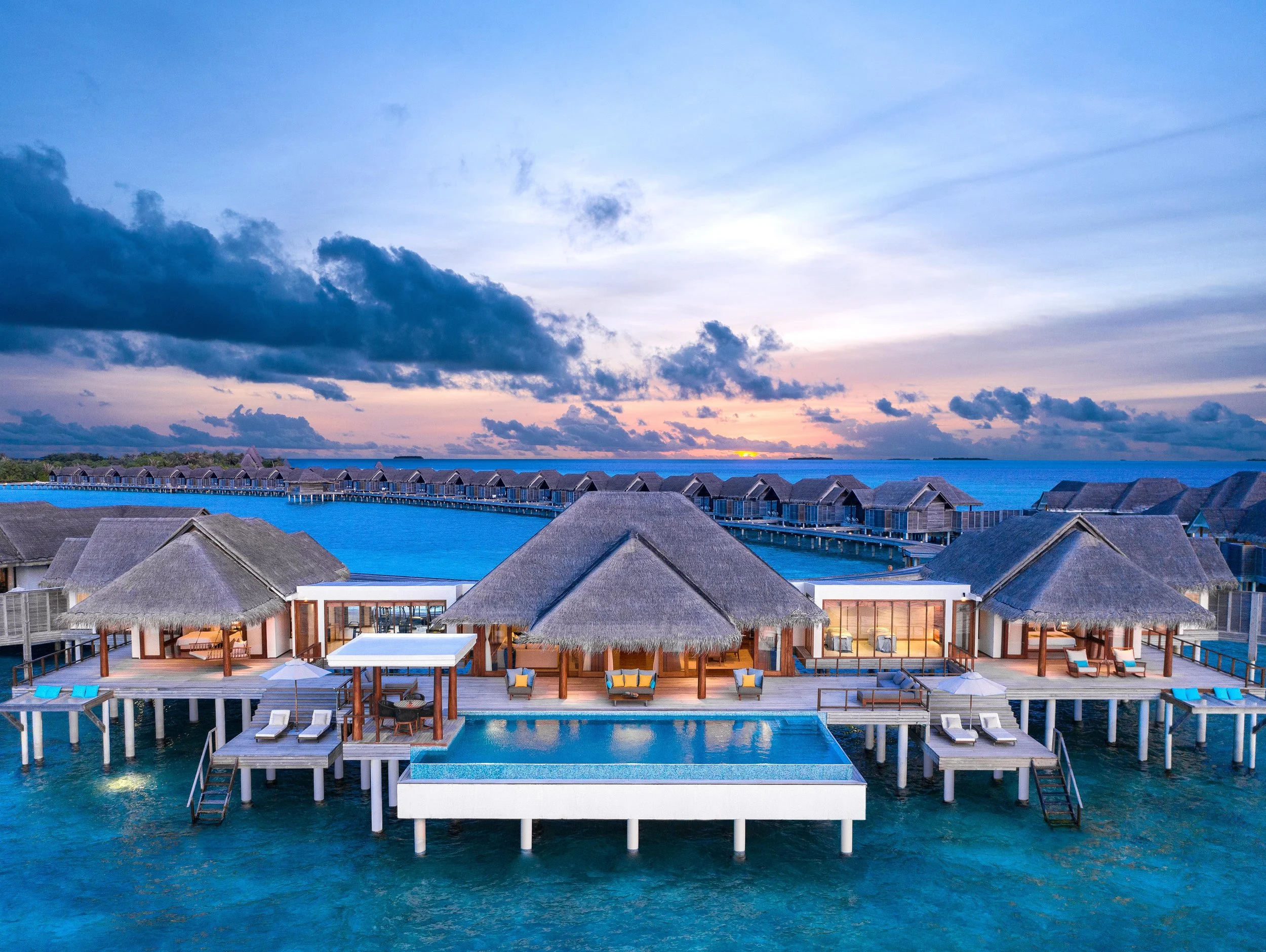 Anantara Kihavah Two-bedroom Sunset Over Water Pool Residence Aerial Sunrise.jpg